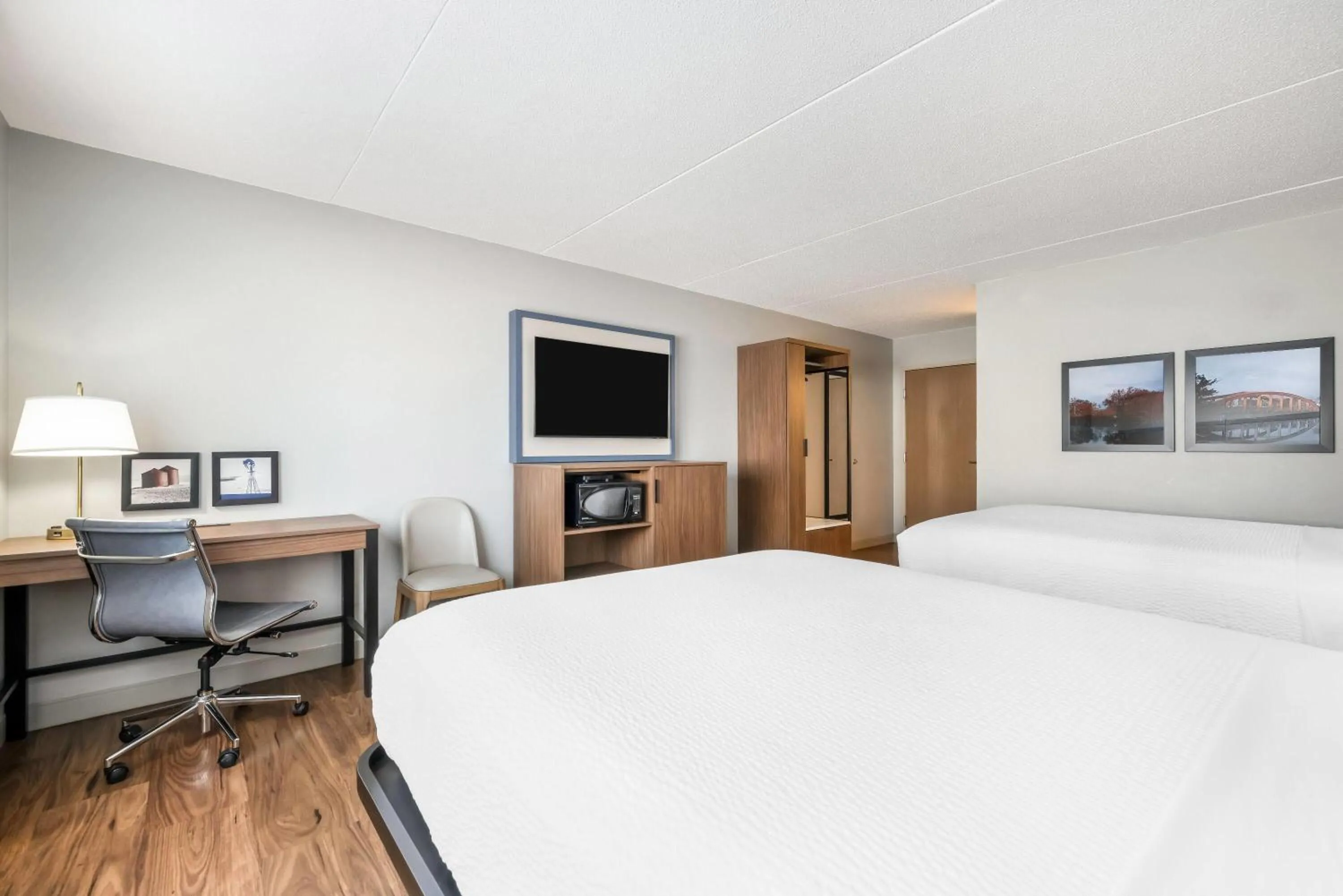 Bed in AmericInn by Wyndham Valley City Conference Center