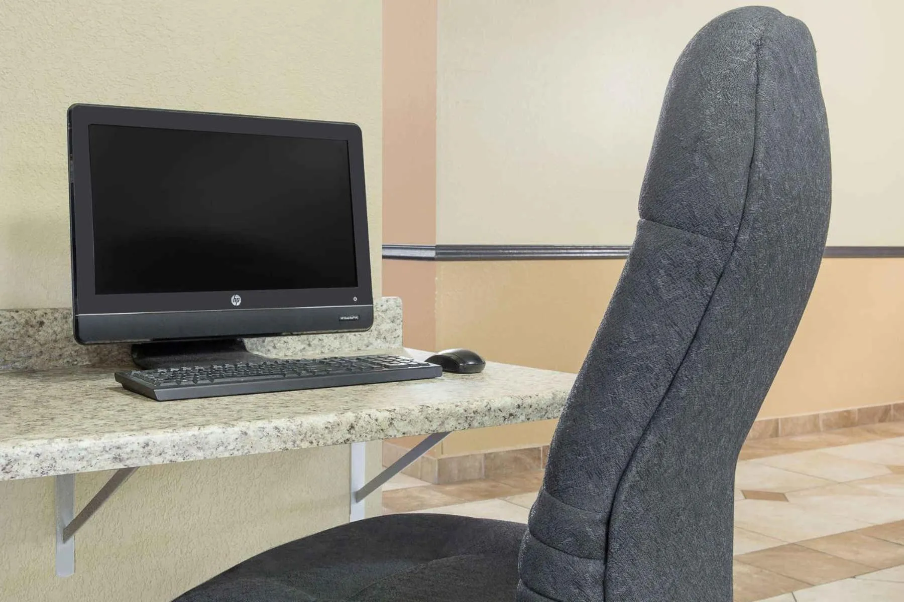 Communal lounge/ TV room in Super 8 by Wyndham Sheboygan WI