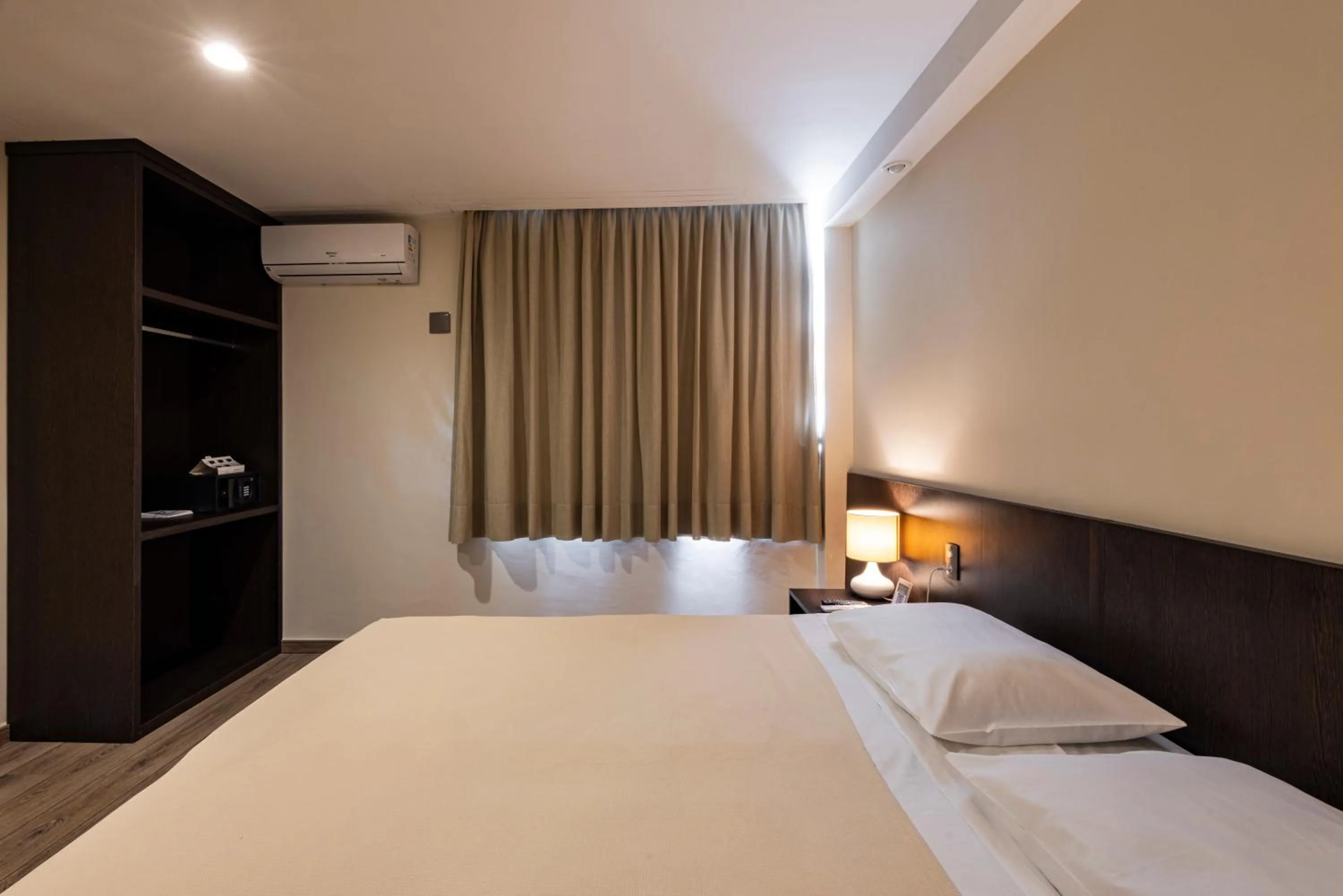 Bed in Arosa Rio Hotel