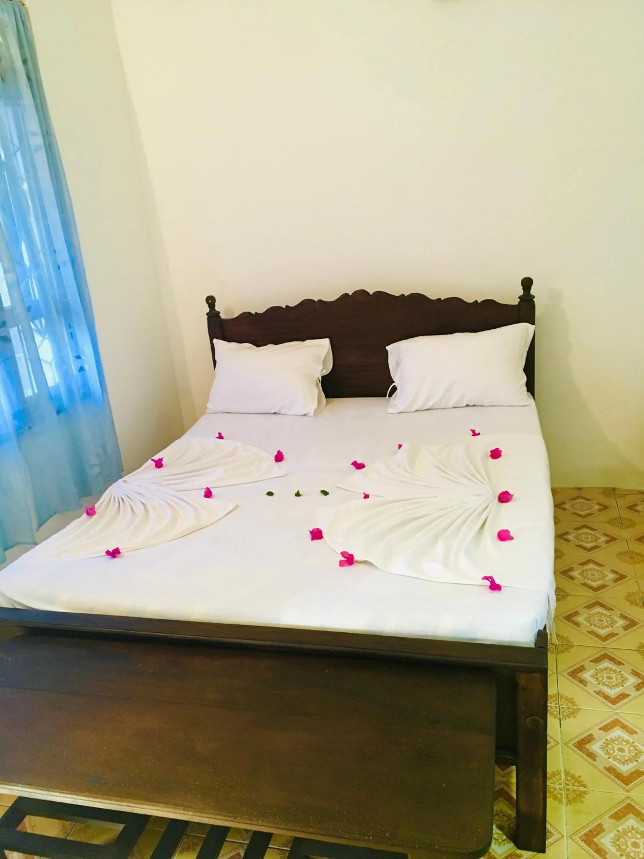 Bed in Shashini Beach Resort