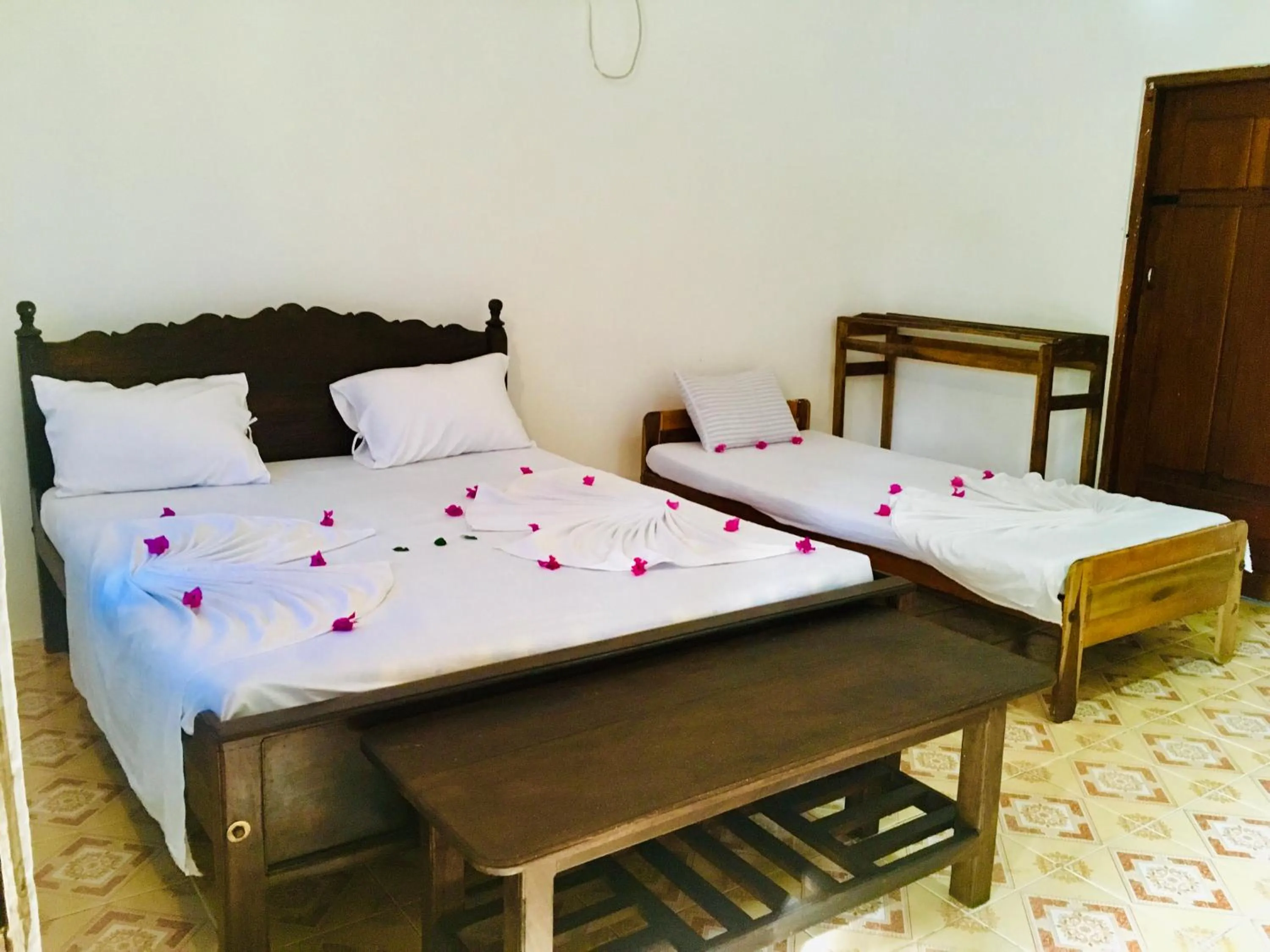 Bed in Shashini Beach Resort