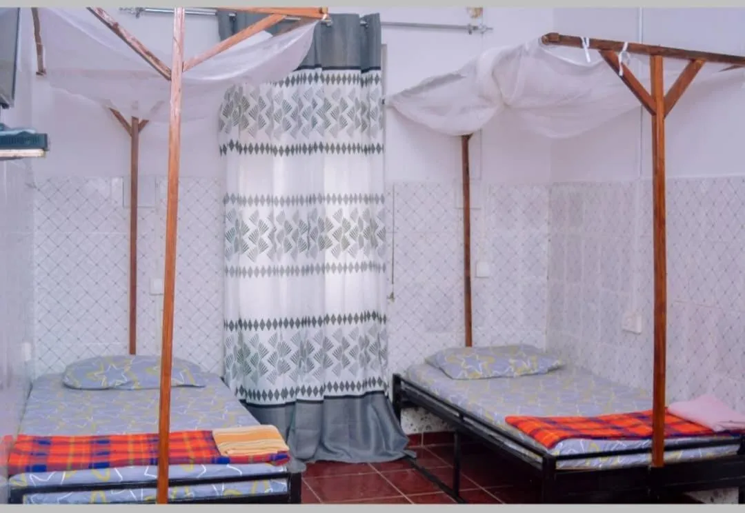 Photo of the whole room, Bed in Rafiki Apartment