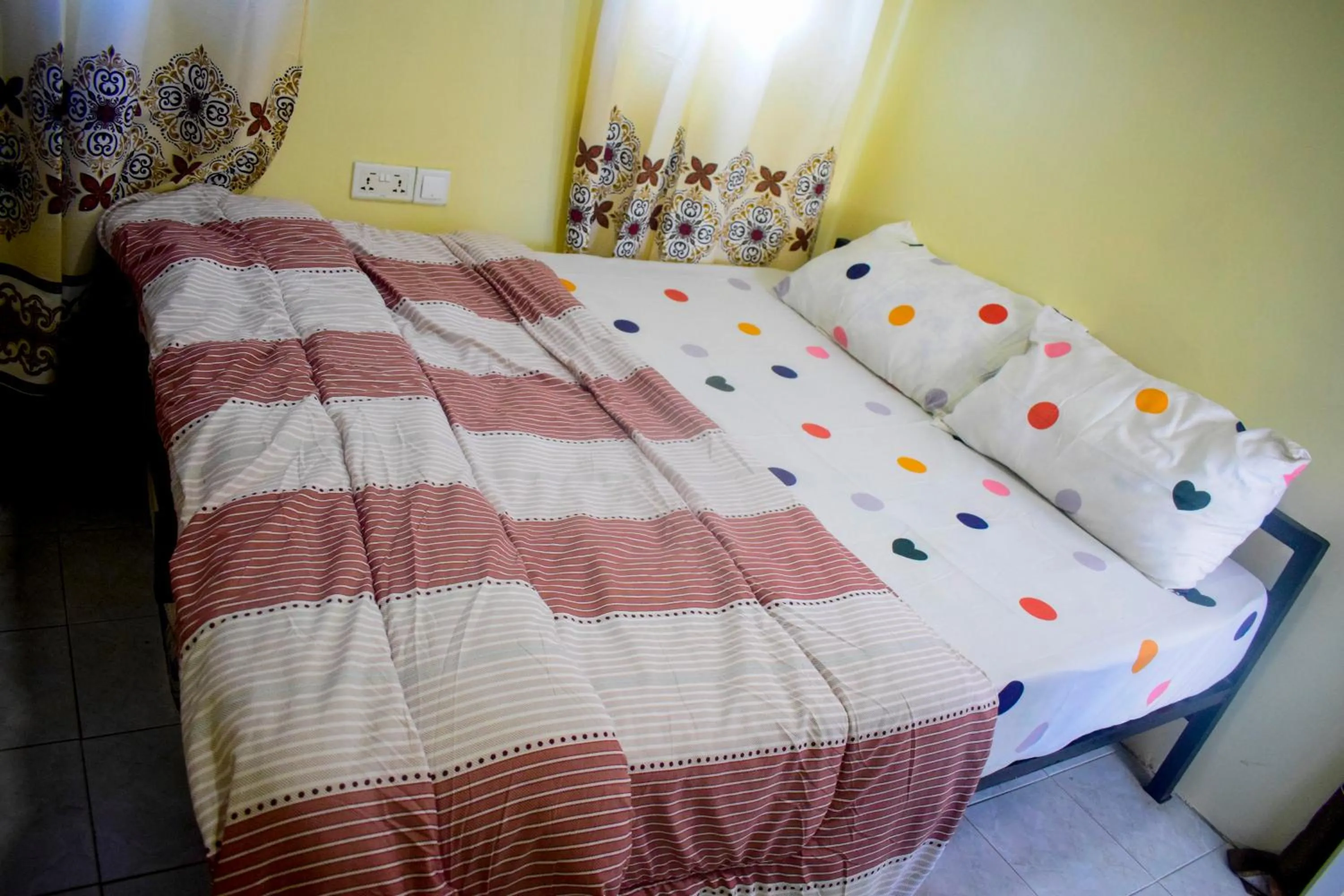 Photo of the whole room, Bed in Rafiki Apartment