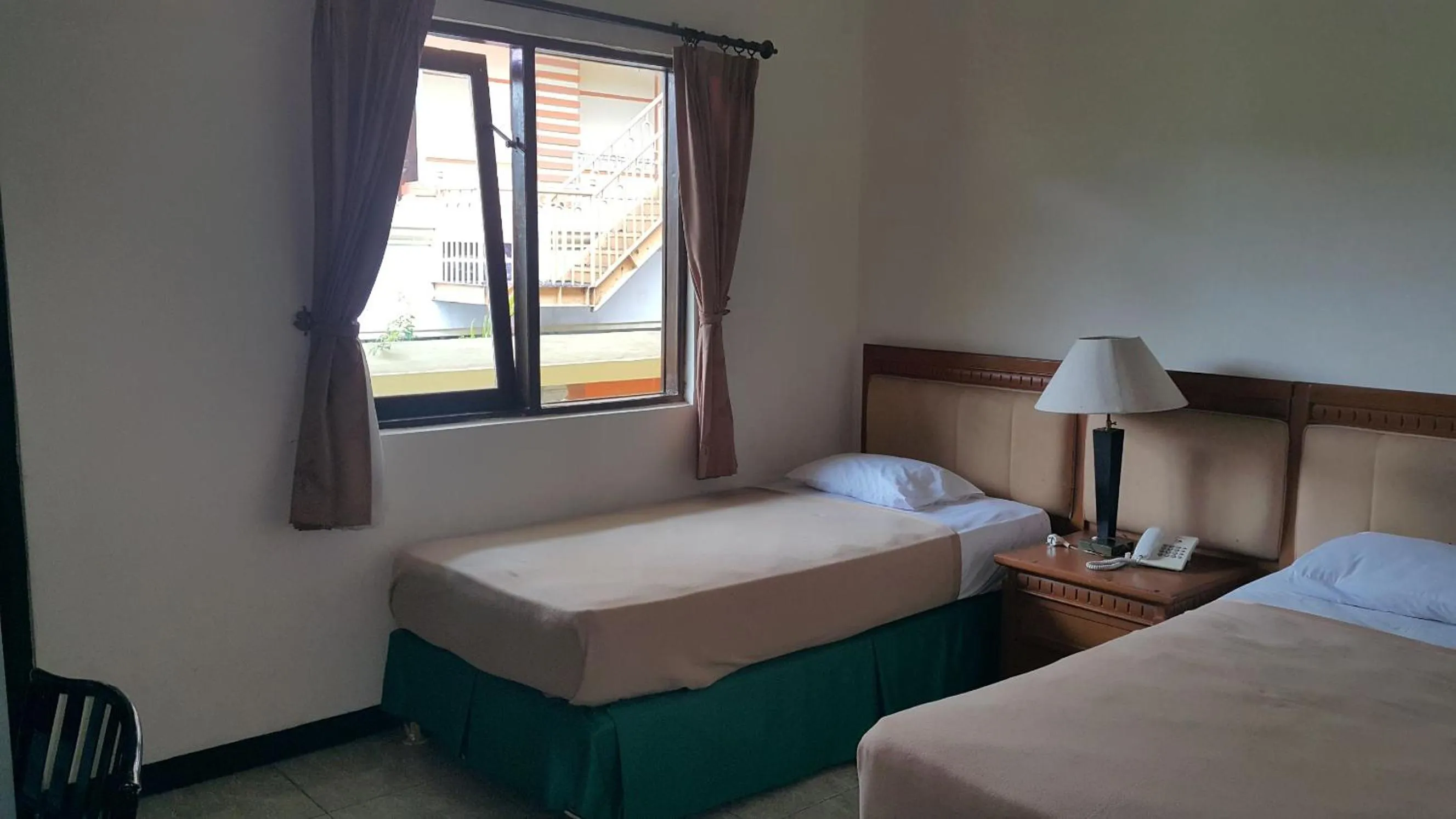 Bed in Top Star Hotel