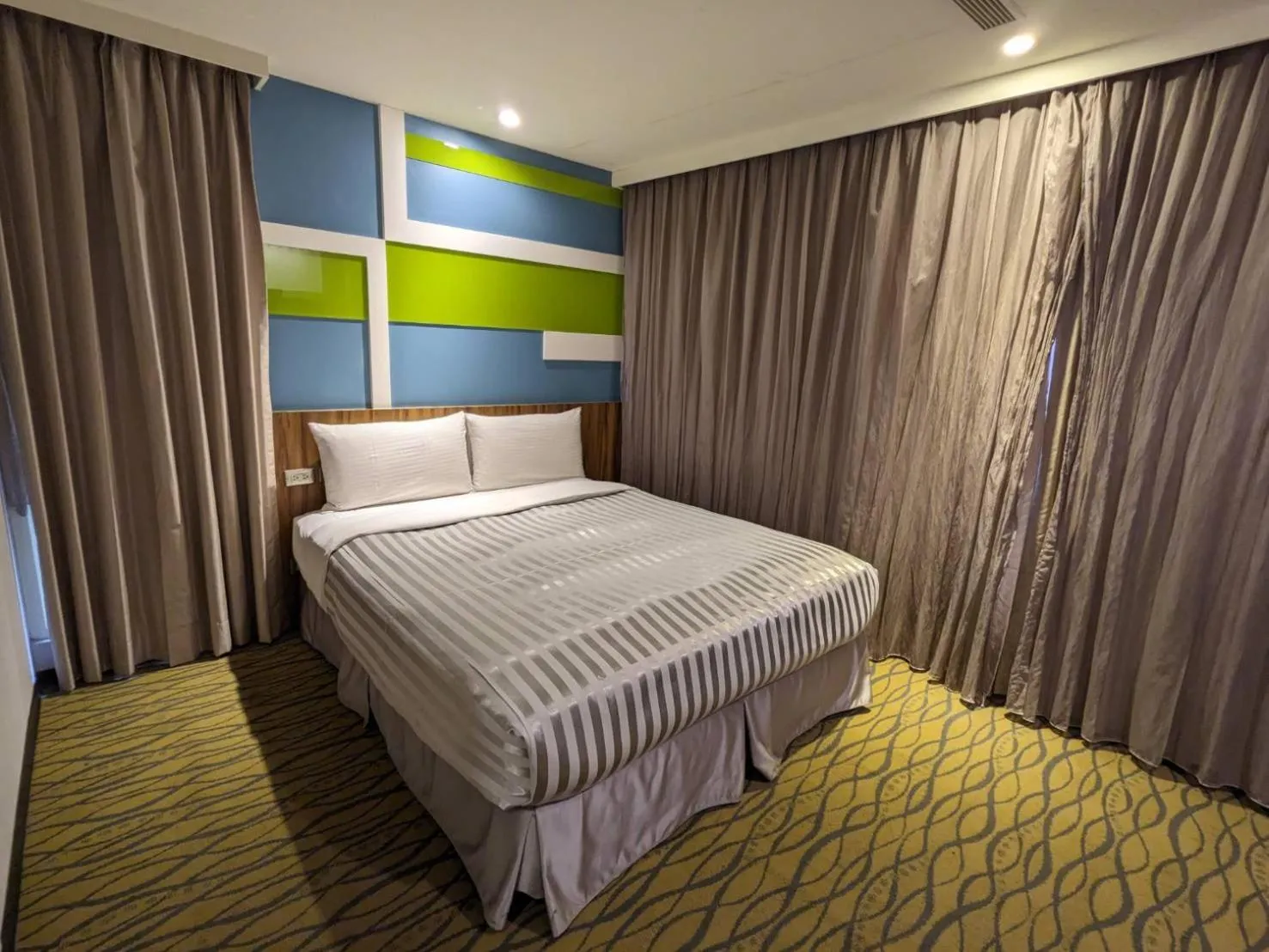 Bed in 西門大飯店 Ximen Hotel