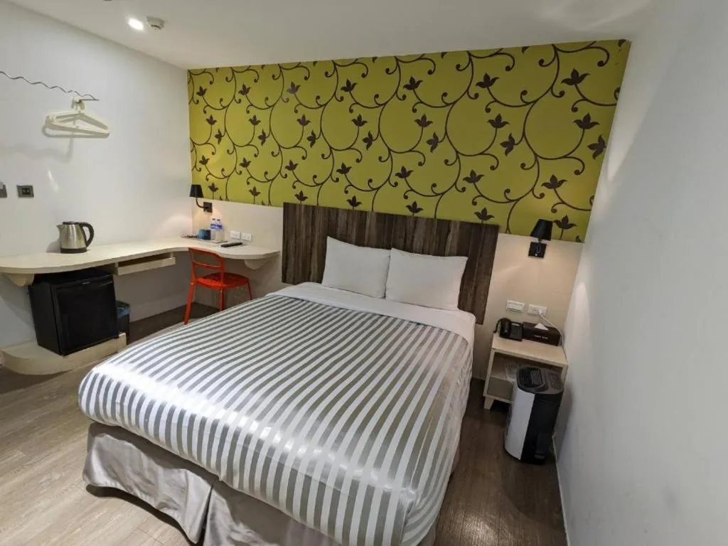 Bed in 西門大飯店 Ximen Hotel