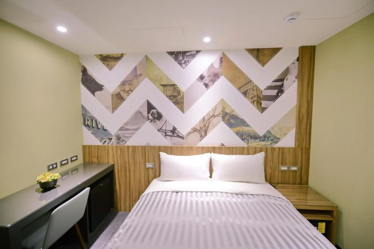 Bed in 西門大飯店 Ximen Hotel