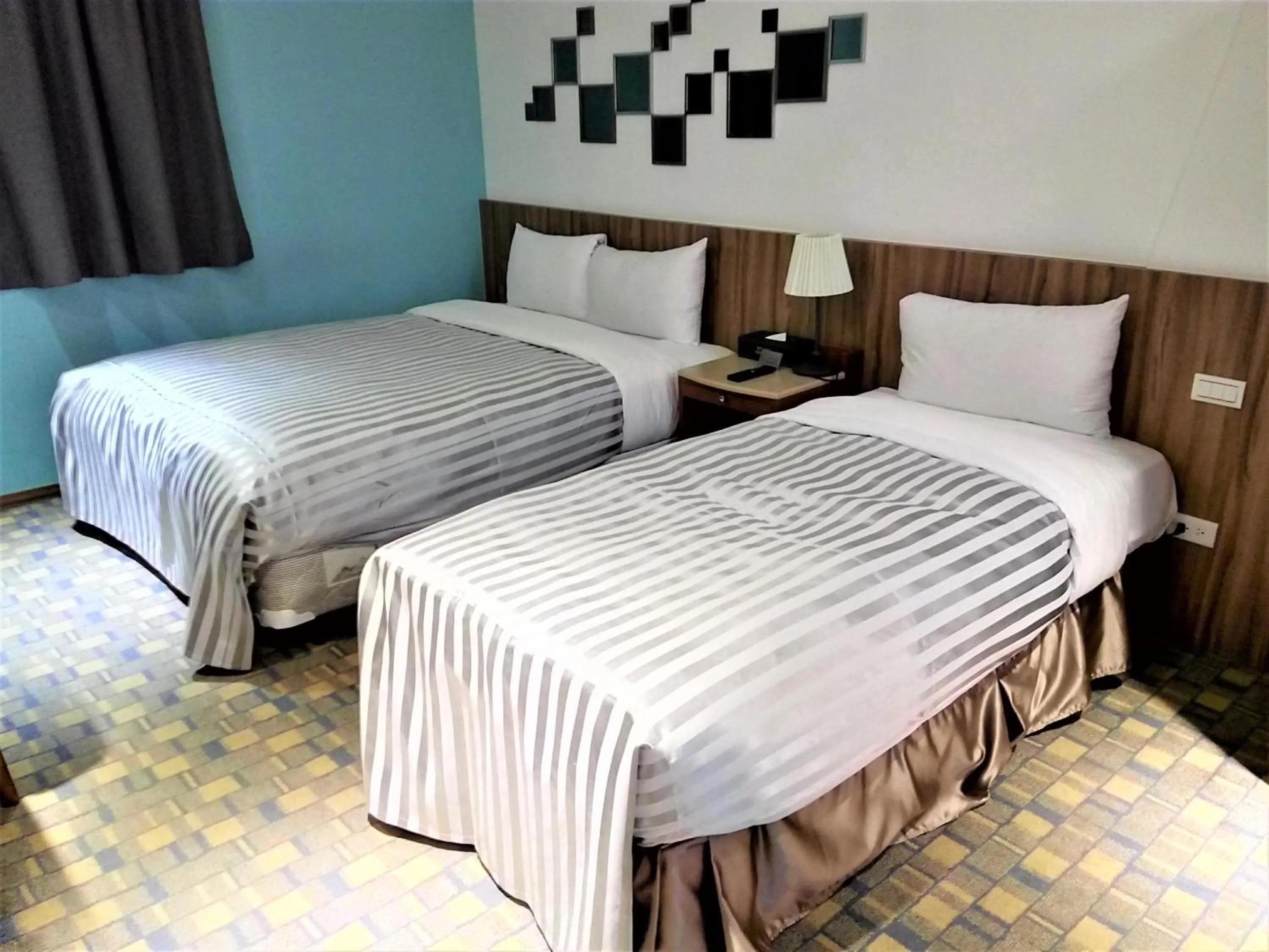 Bed in 西門大飯店 Ximen Hotel