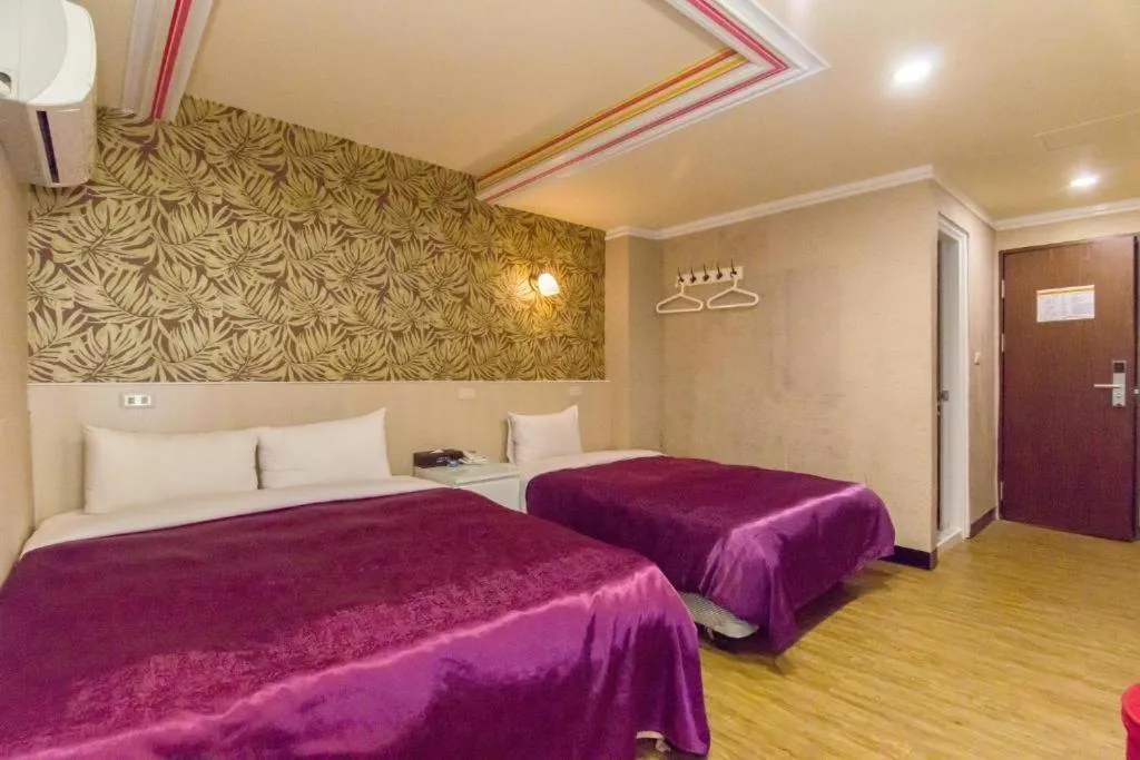 Bed in 西門大飯店 Ximen Hotel