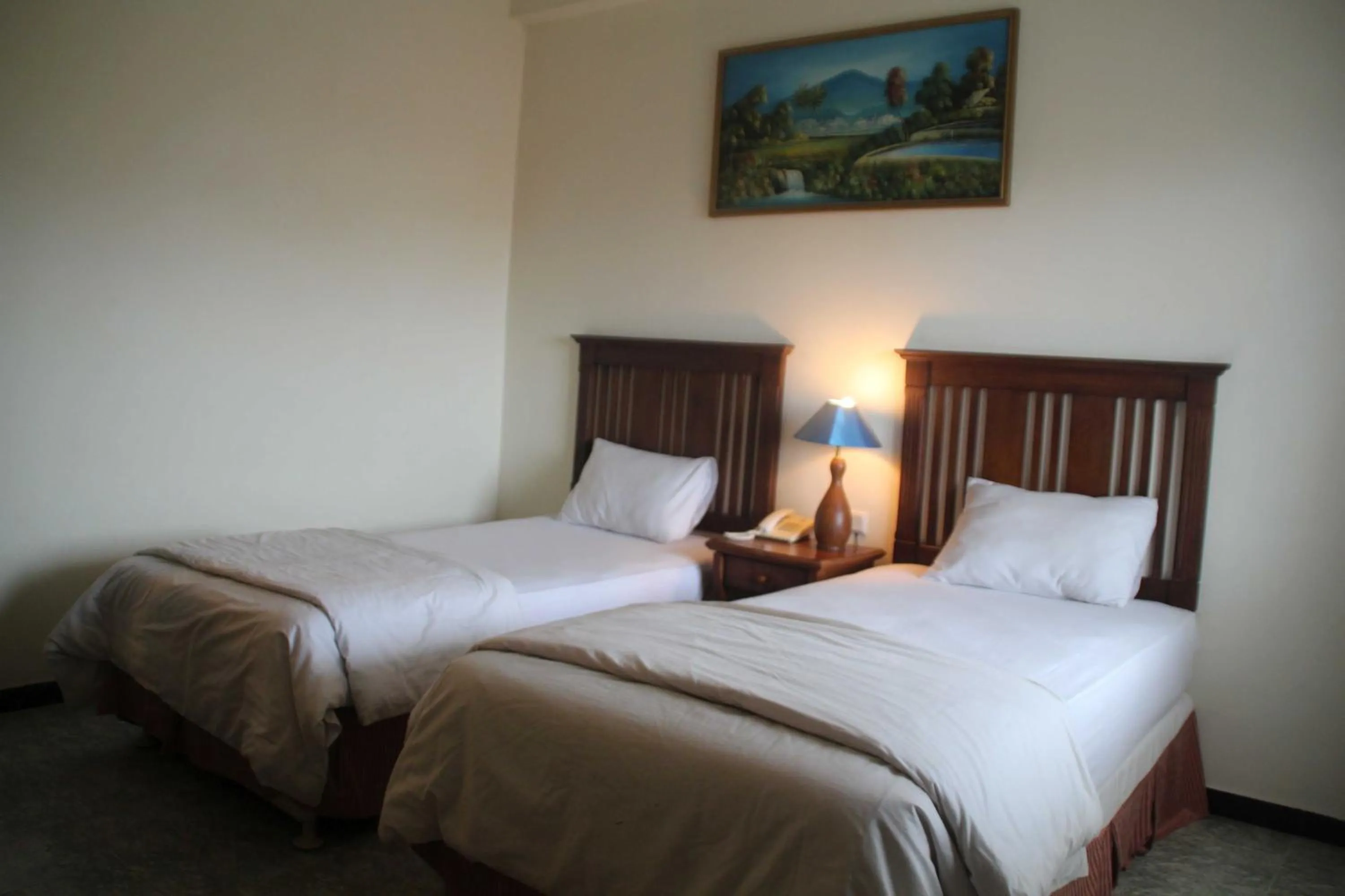 Bed in Mega Bintang Sweet Hotel