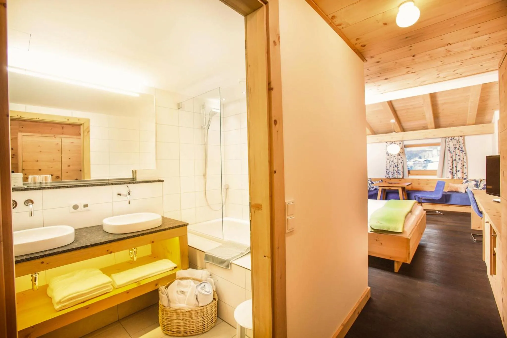 Bathroom, Bed in Hotel Glemmtalerhof