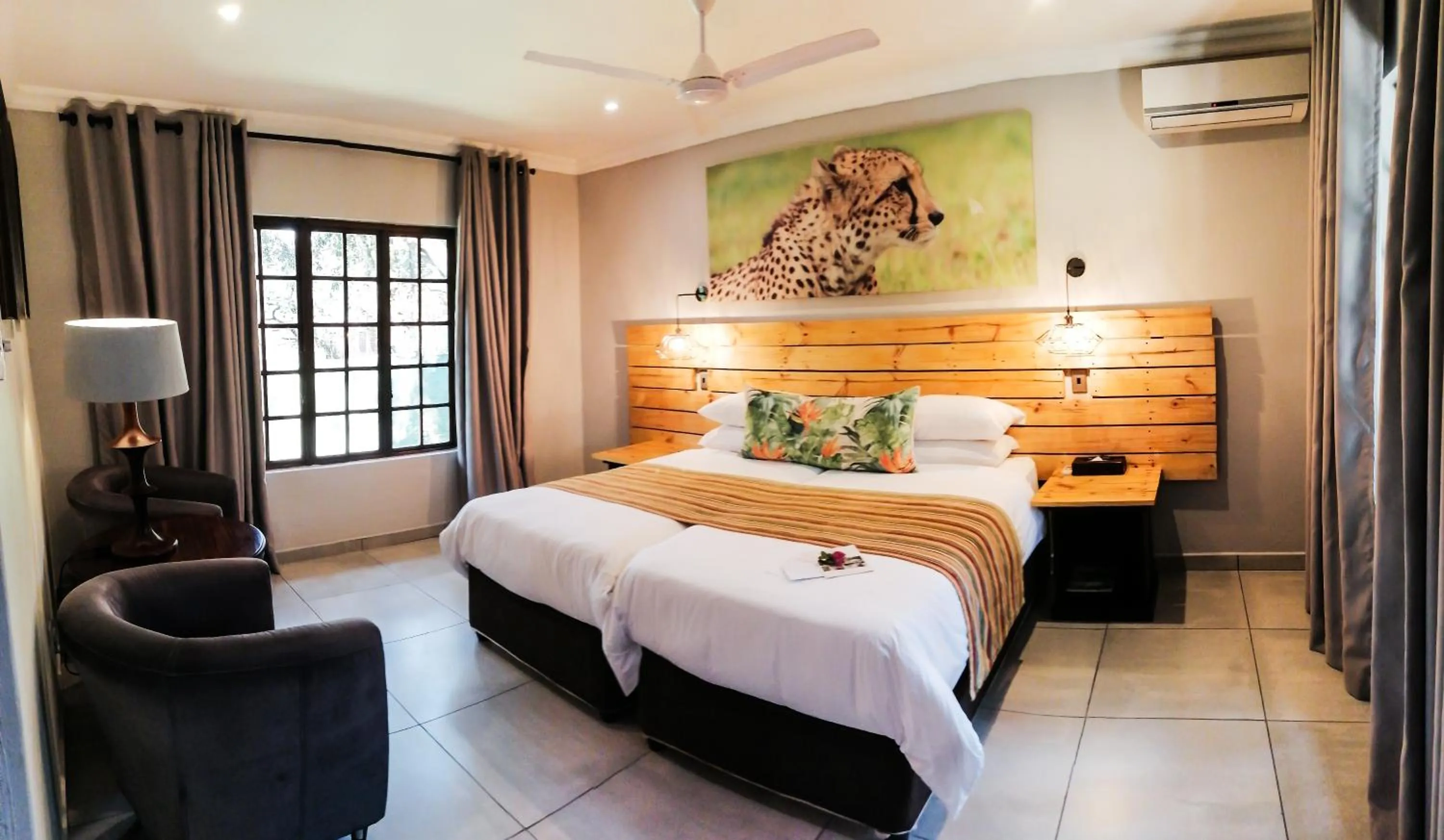 Bed in Emdoneni Lodge with Zululand Cat Conservation Project