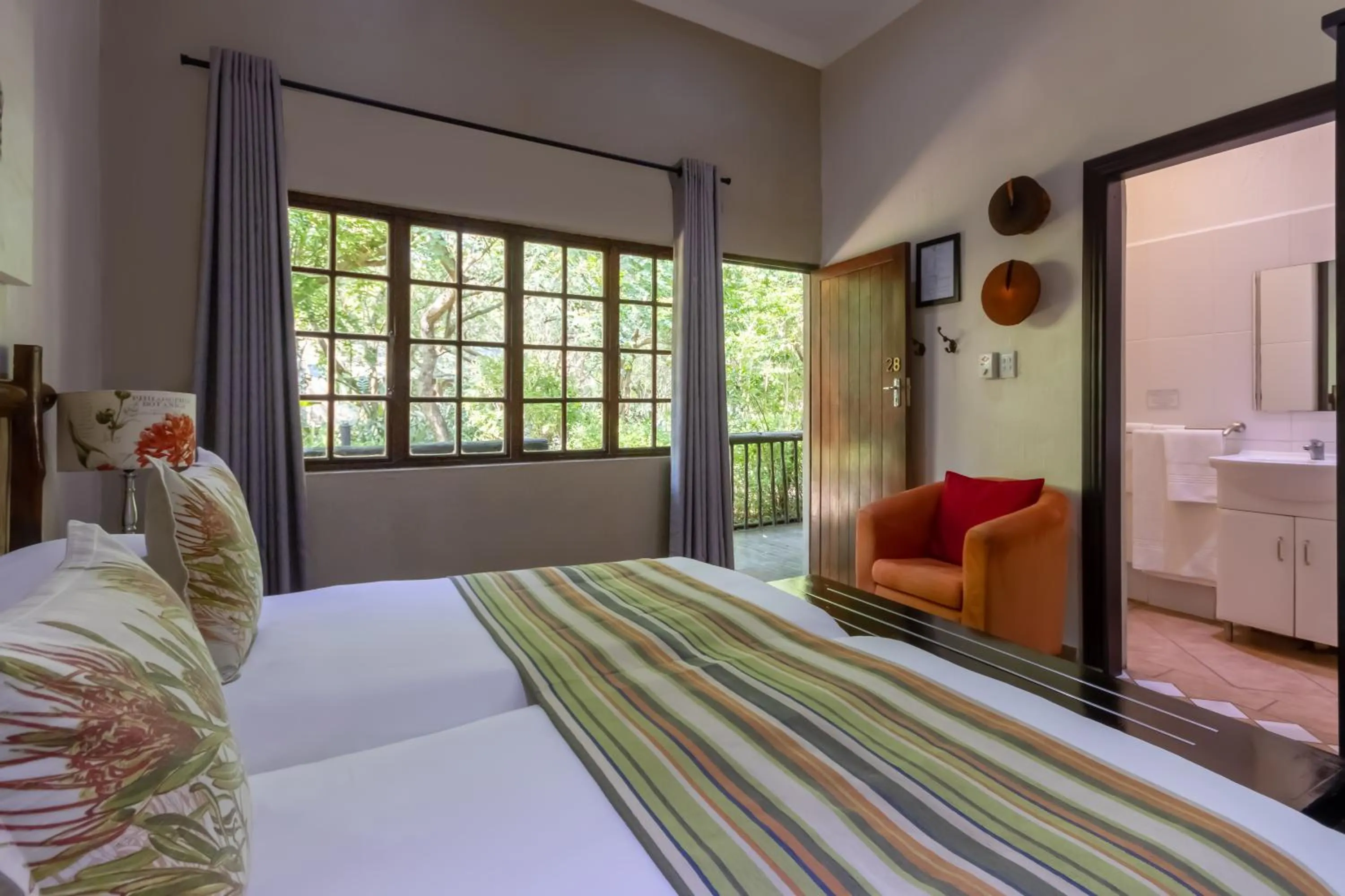 Bed in Emdoneni Lodge with Zululand Cat Conservation Project