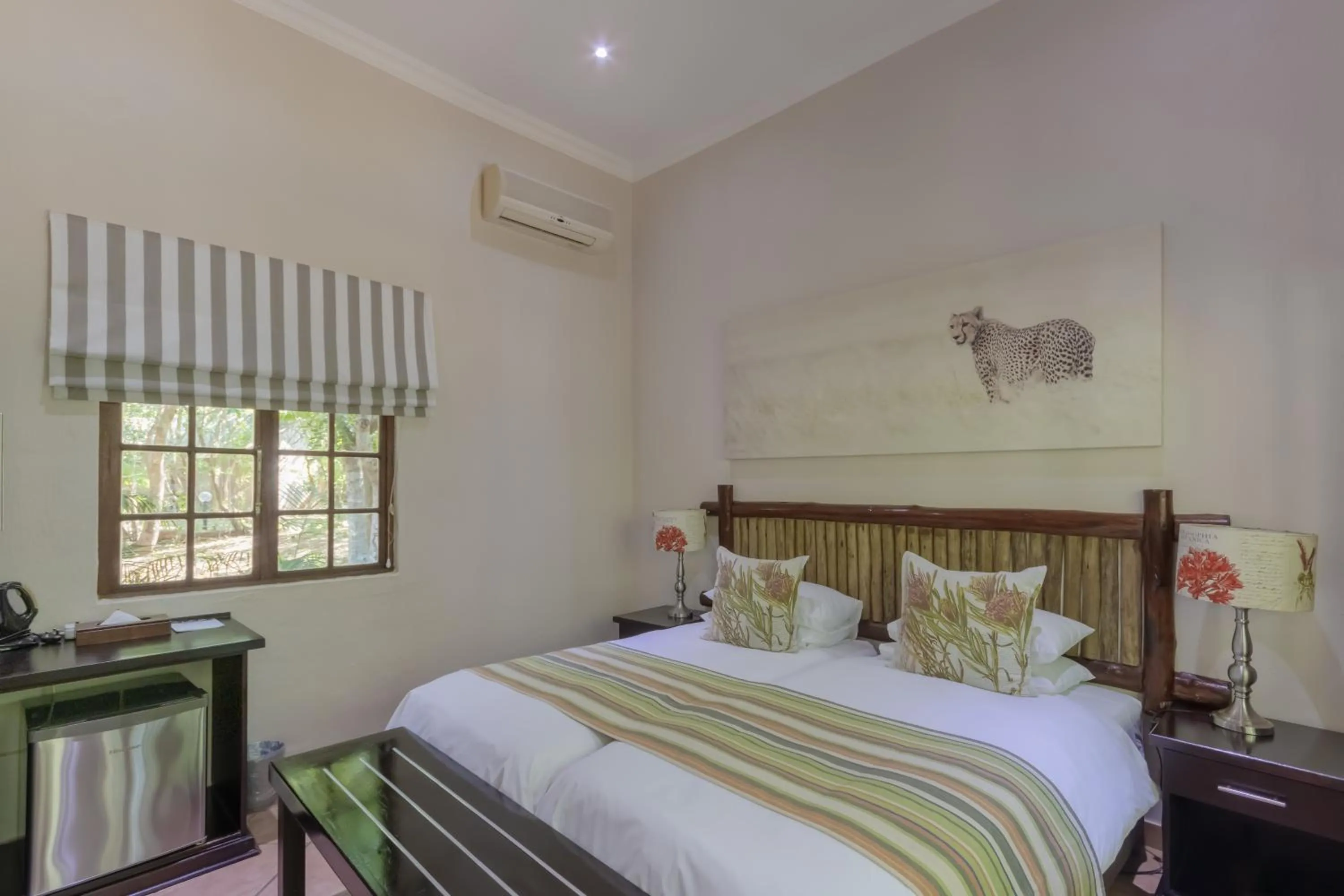 Bed in Emdoneni Lodge with Zululand Cat Conservation Project