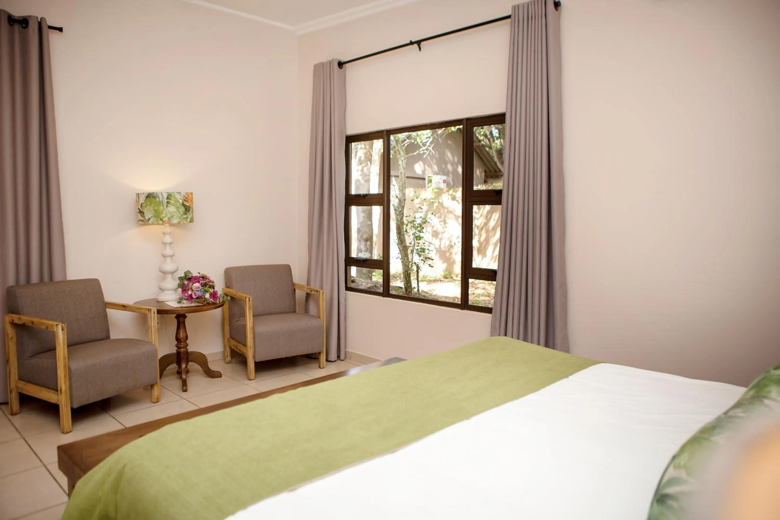 Bed in Emdoneni Lodge with Zululand Cat Conservation Project