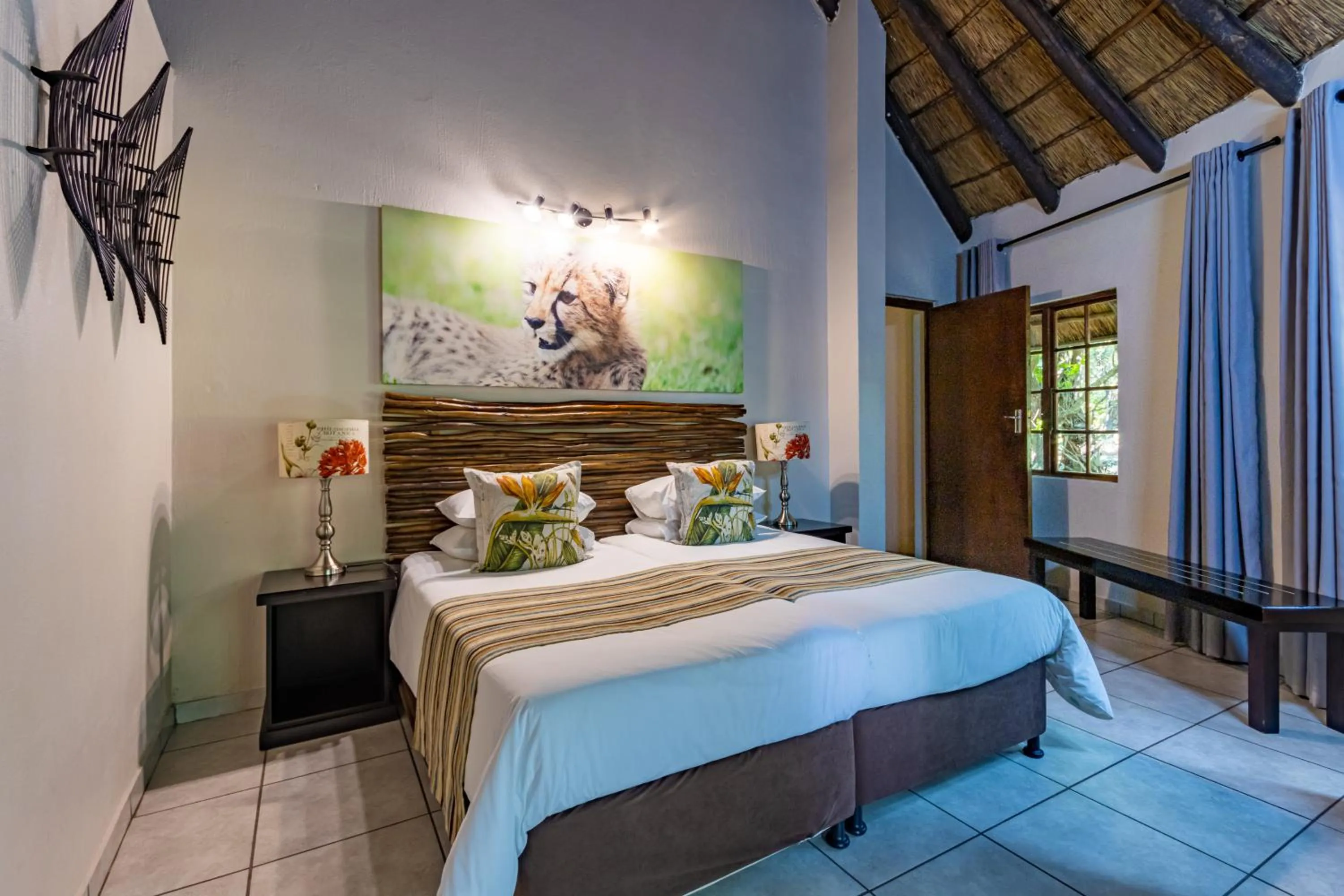 Bed in Emdoneni Lodge with Zululand Cat Conservation Project