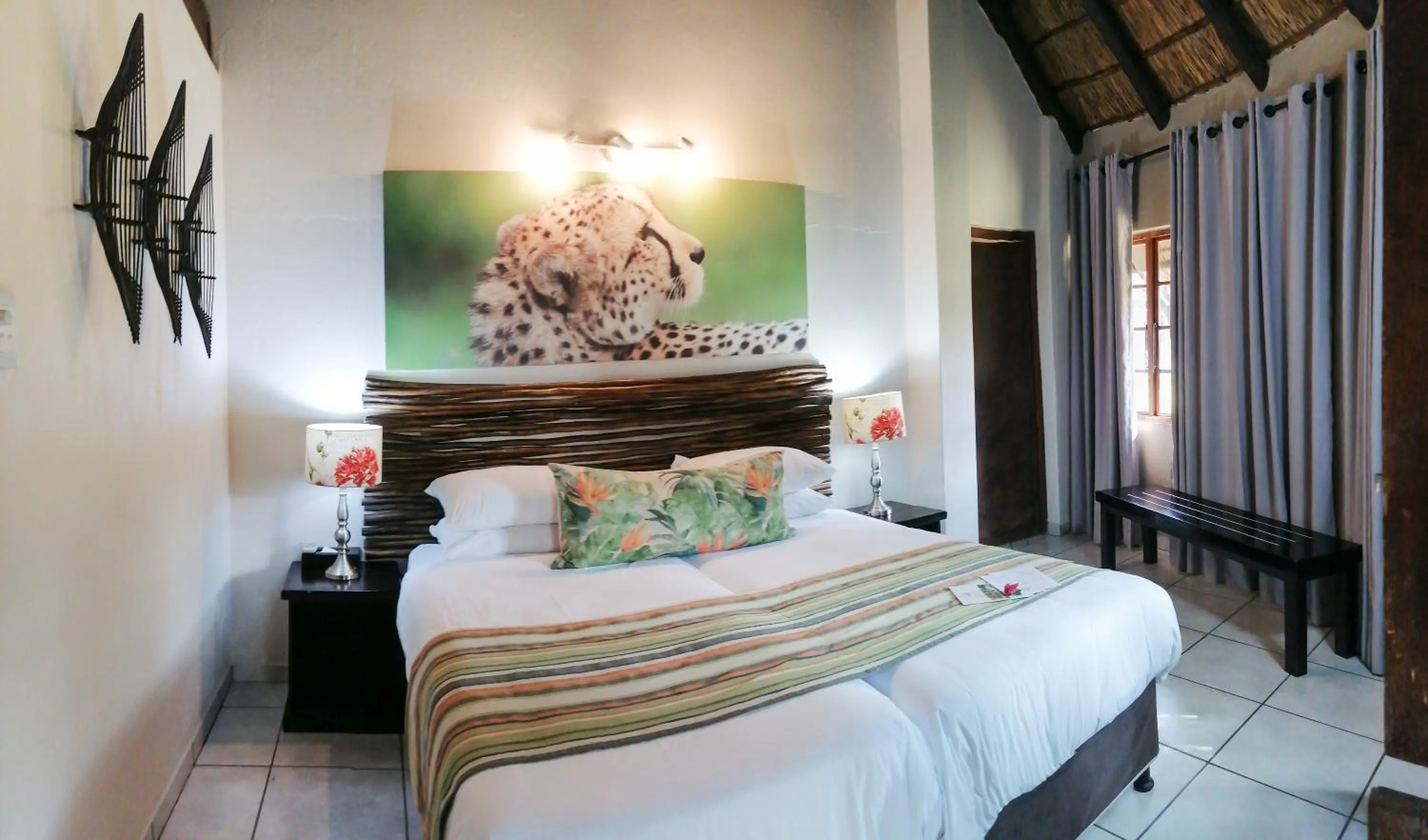 Bed in Emdoneni Lodge with Zululand Cat Conservation Project