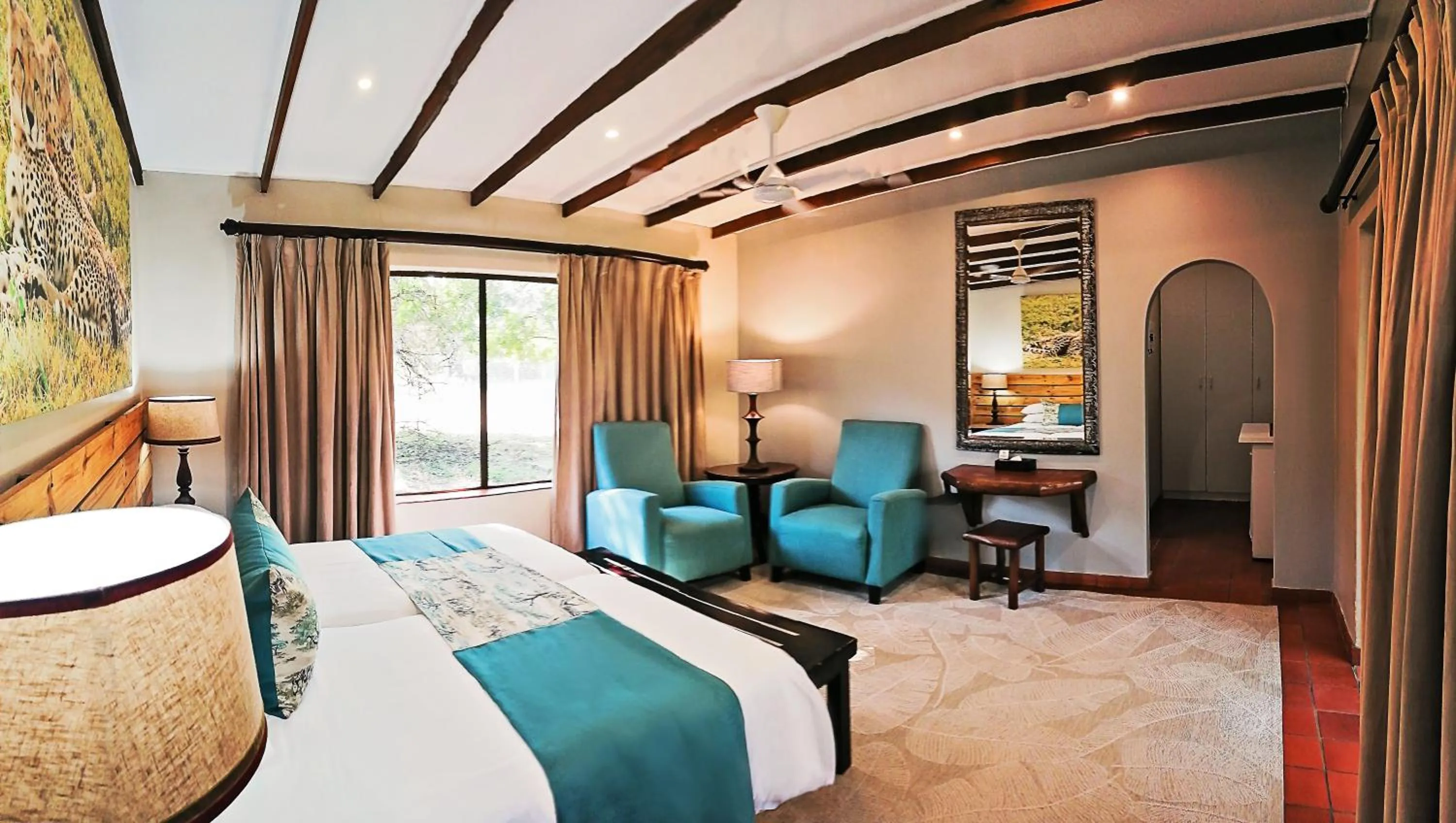 Bed in Emdoneni Lodge with Zululand Cat Conservation Project
