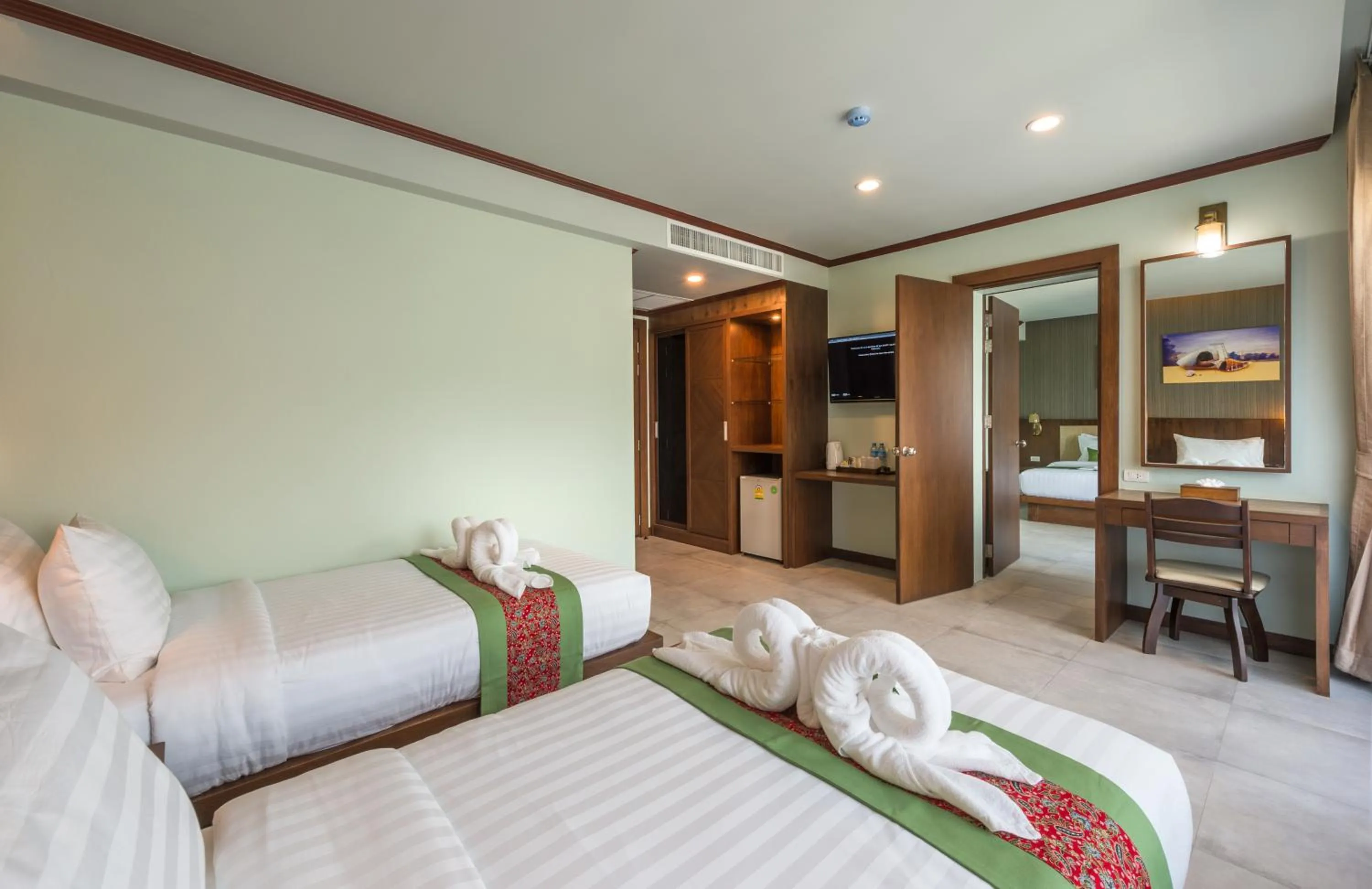 Bed in Andaman Breeze Resort