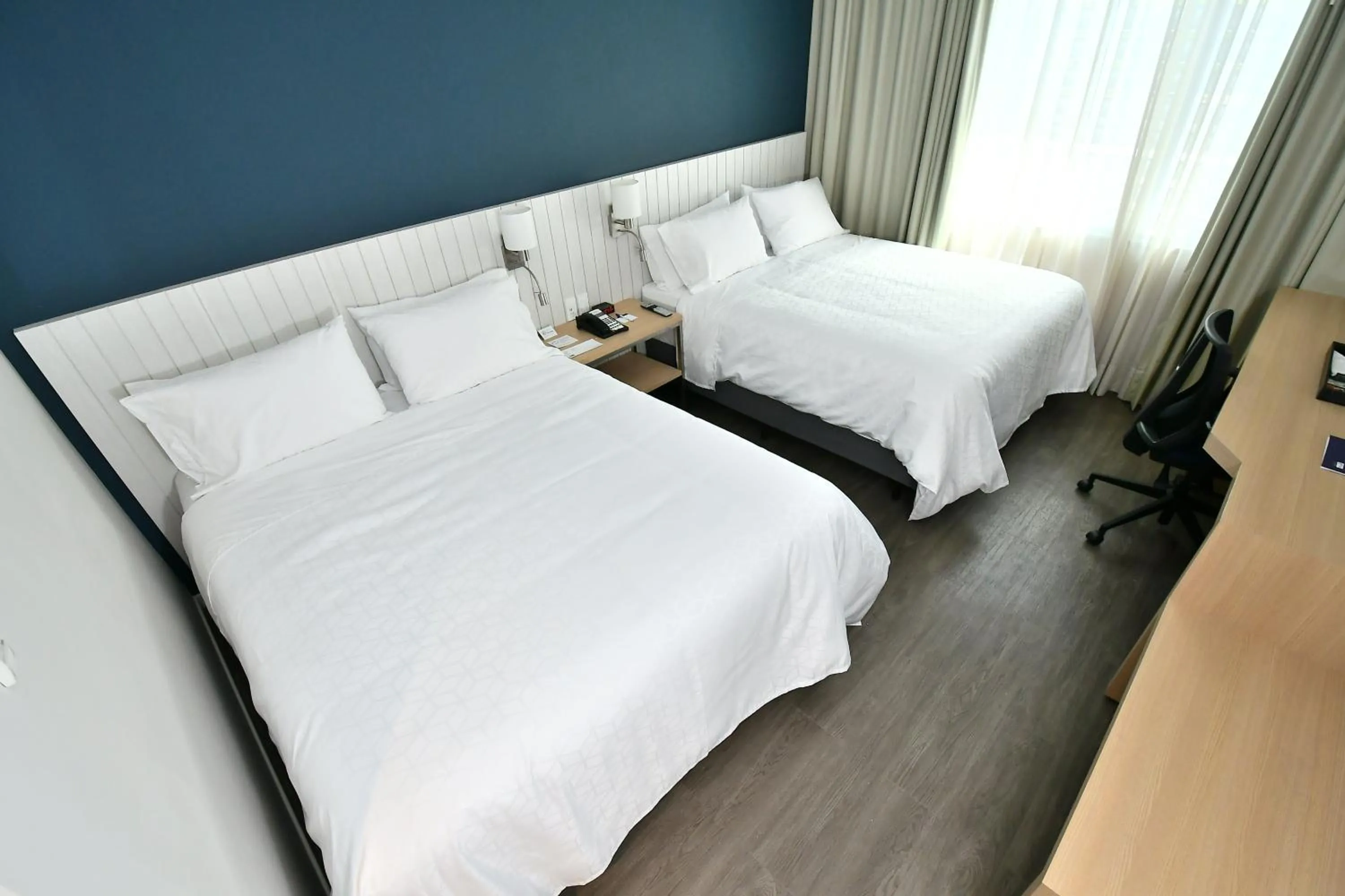 Bed in Holiday Inn Express Asuncion Aviadores by IHG