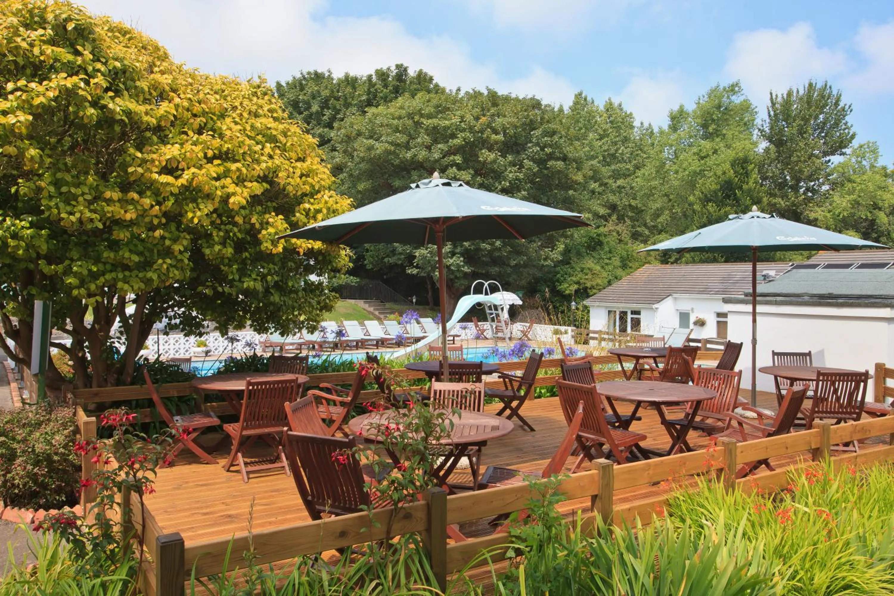 Patio in La Collinette Hotel, Cottages & Apartments
