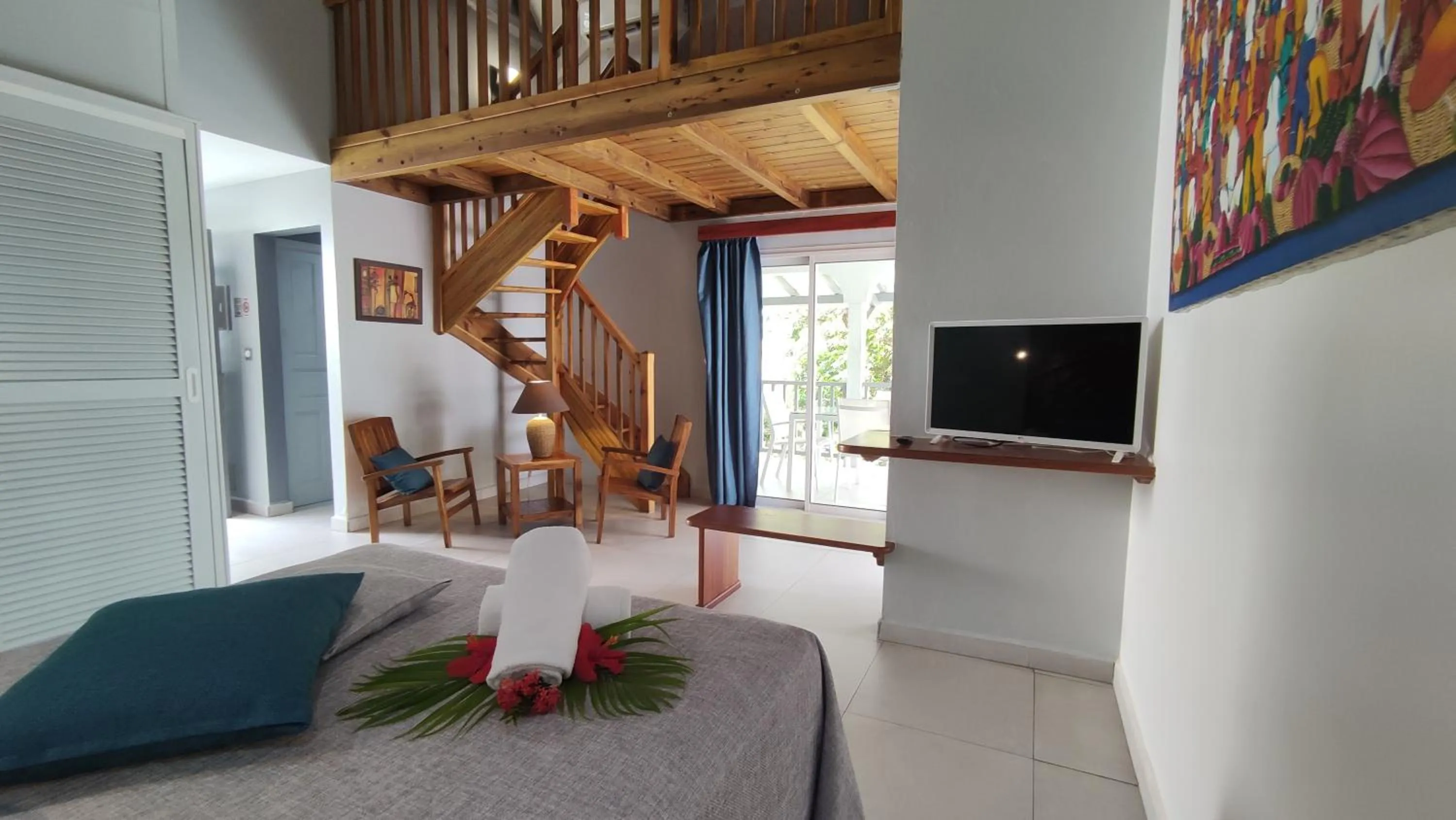 Communal lounge/ TV room in Habitation Grande Anse Résidence hôtelière