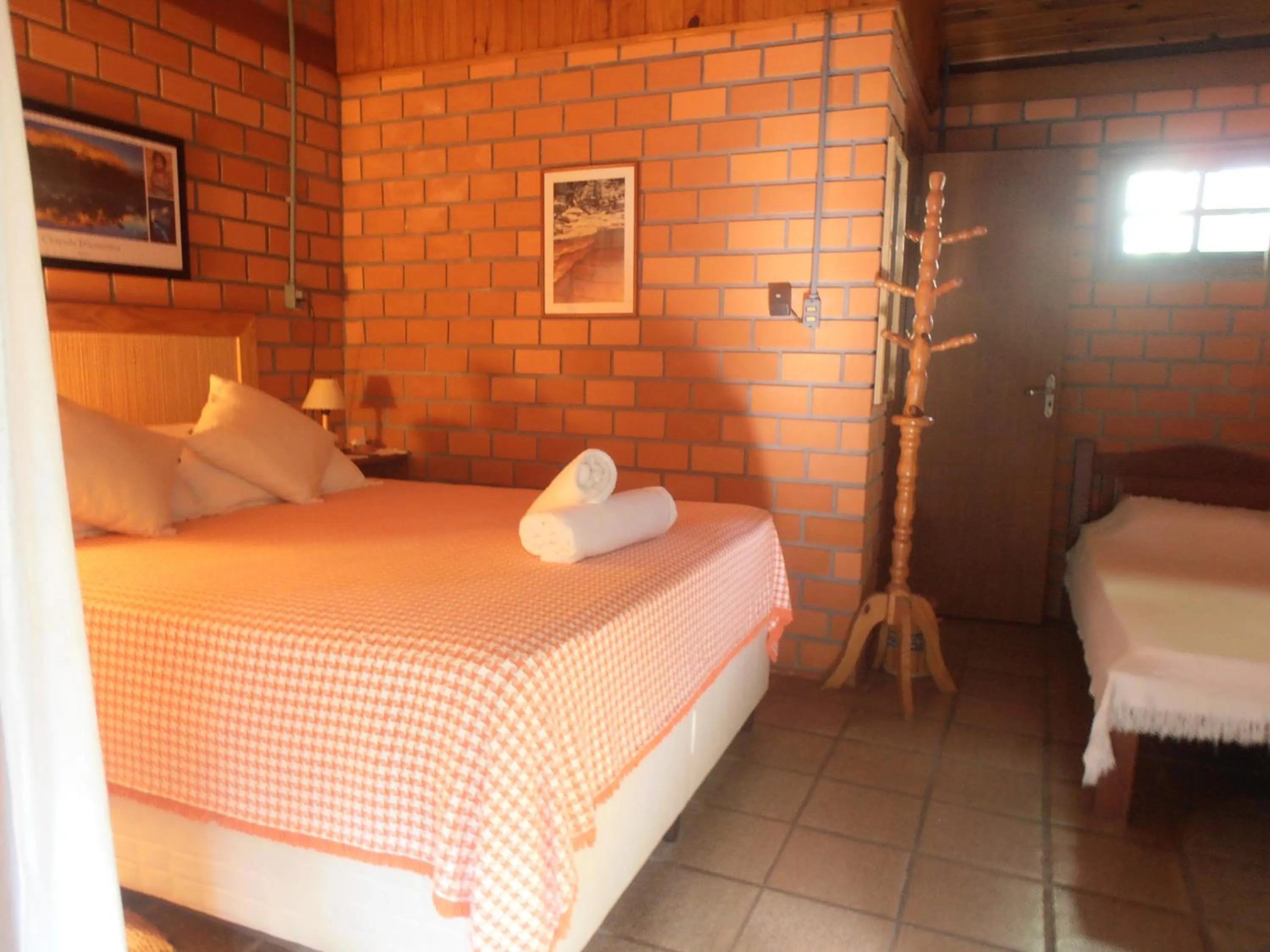 Photo of the whole room, Bed in Pousada Rosa & Canela