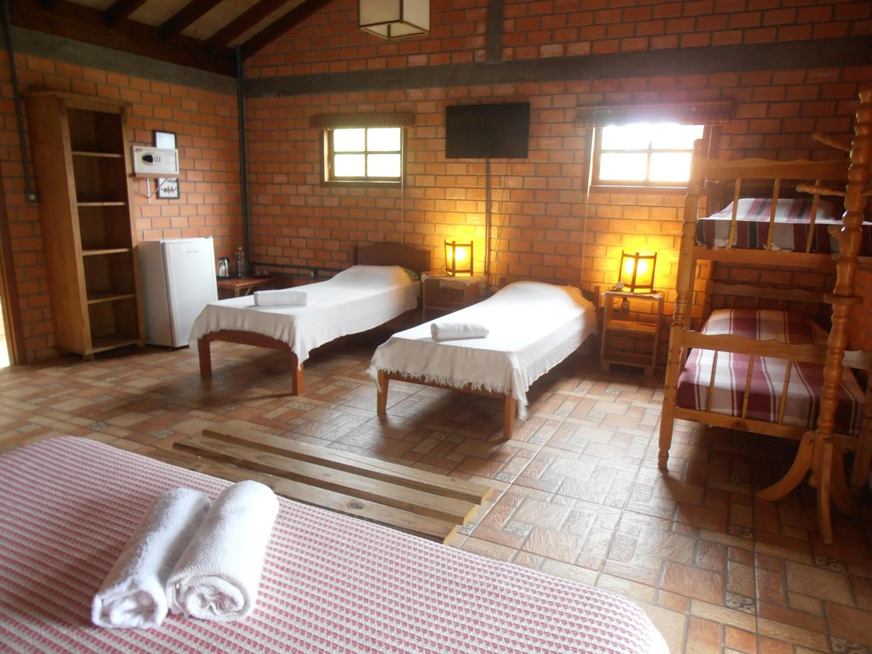 Photo of the whole room, Bed in Pousada Rosa & Canela