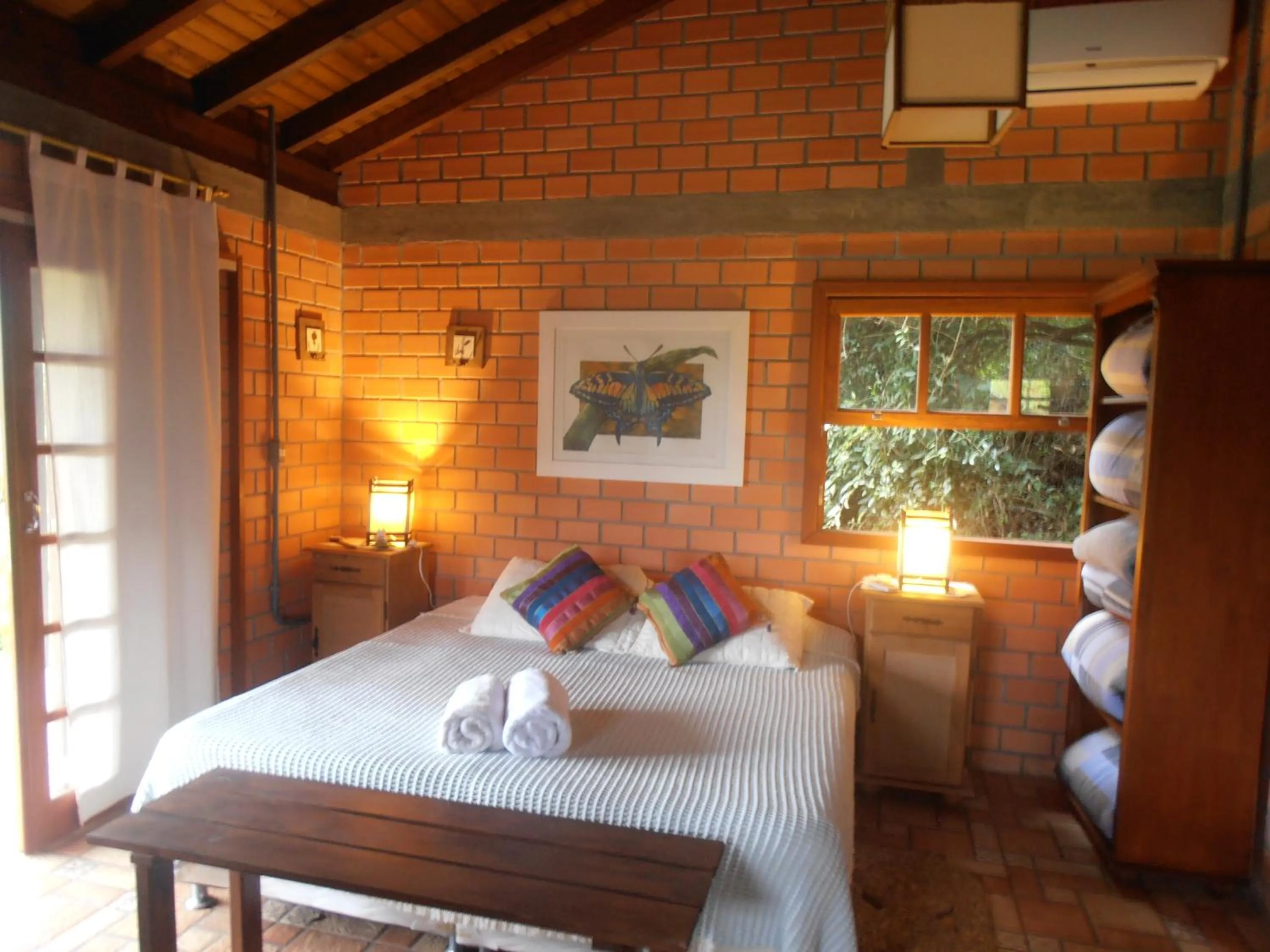 Photo of the whole room, Bed in Pousada Rosa & Canela