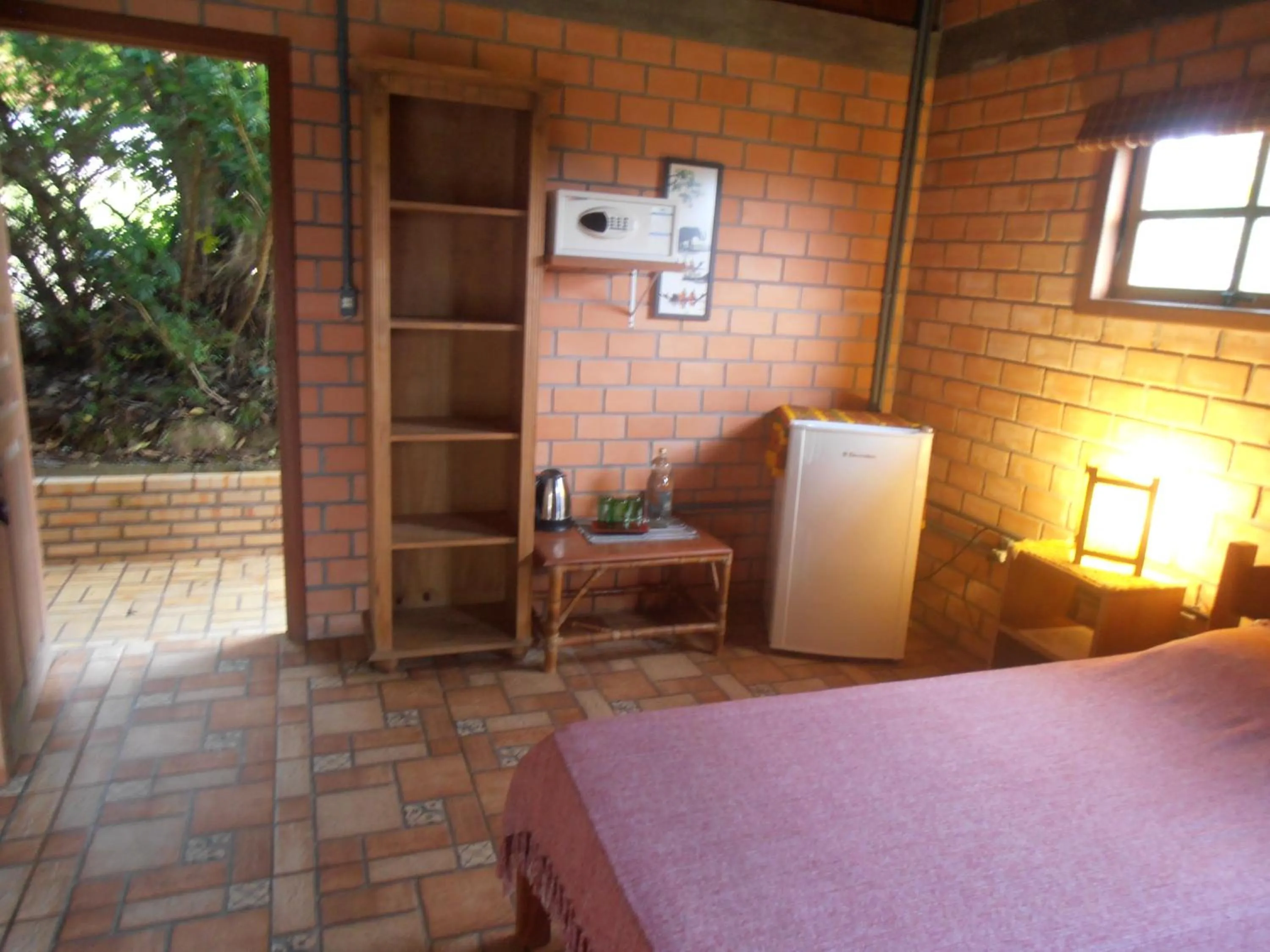 Photo of the whole room, Bed in Pousada Rosa & Canela