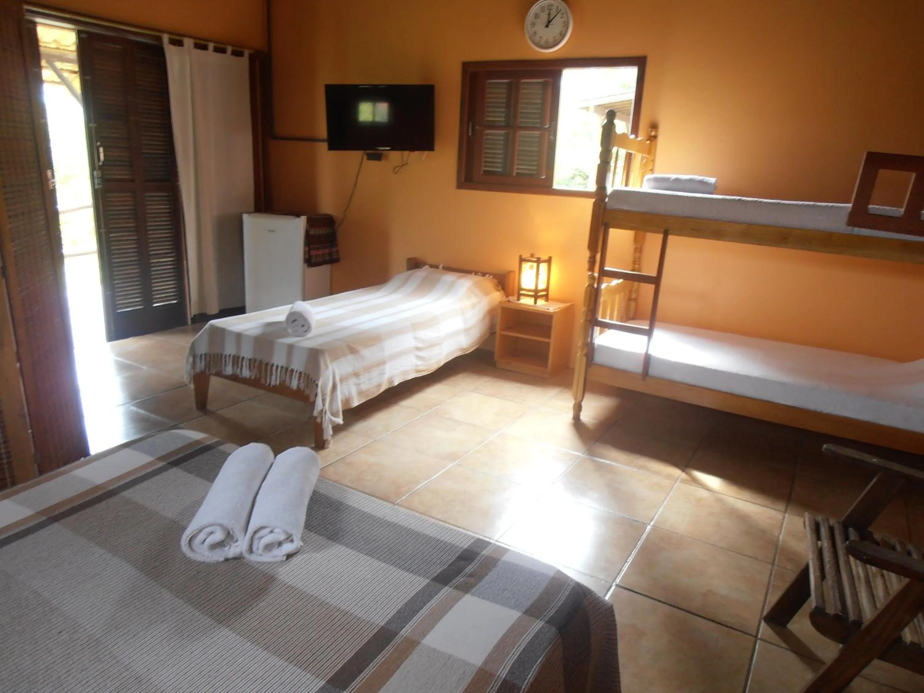 Photo of the whole room, Bed in Pousada Rosa & Canela