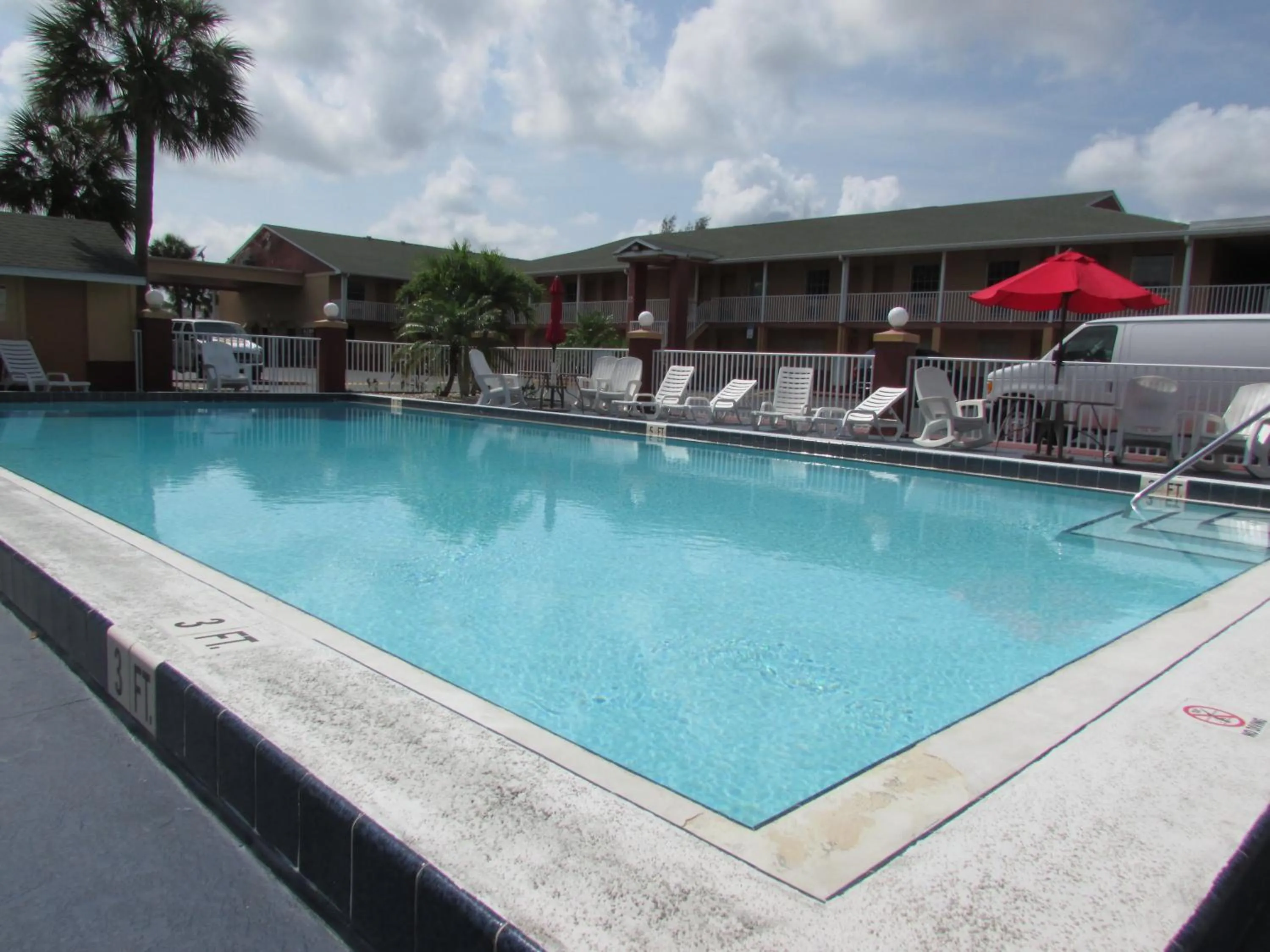Swimming pool in Howard Johnson by Wyndham Ft. Myers FL