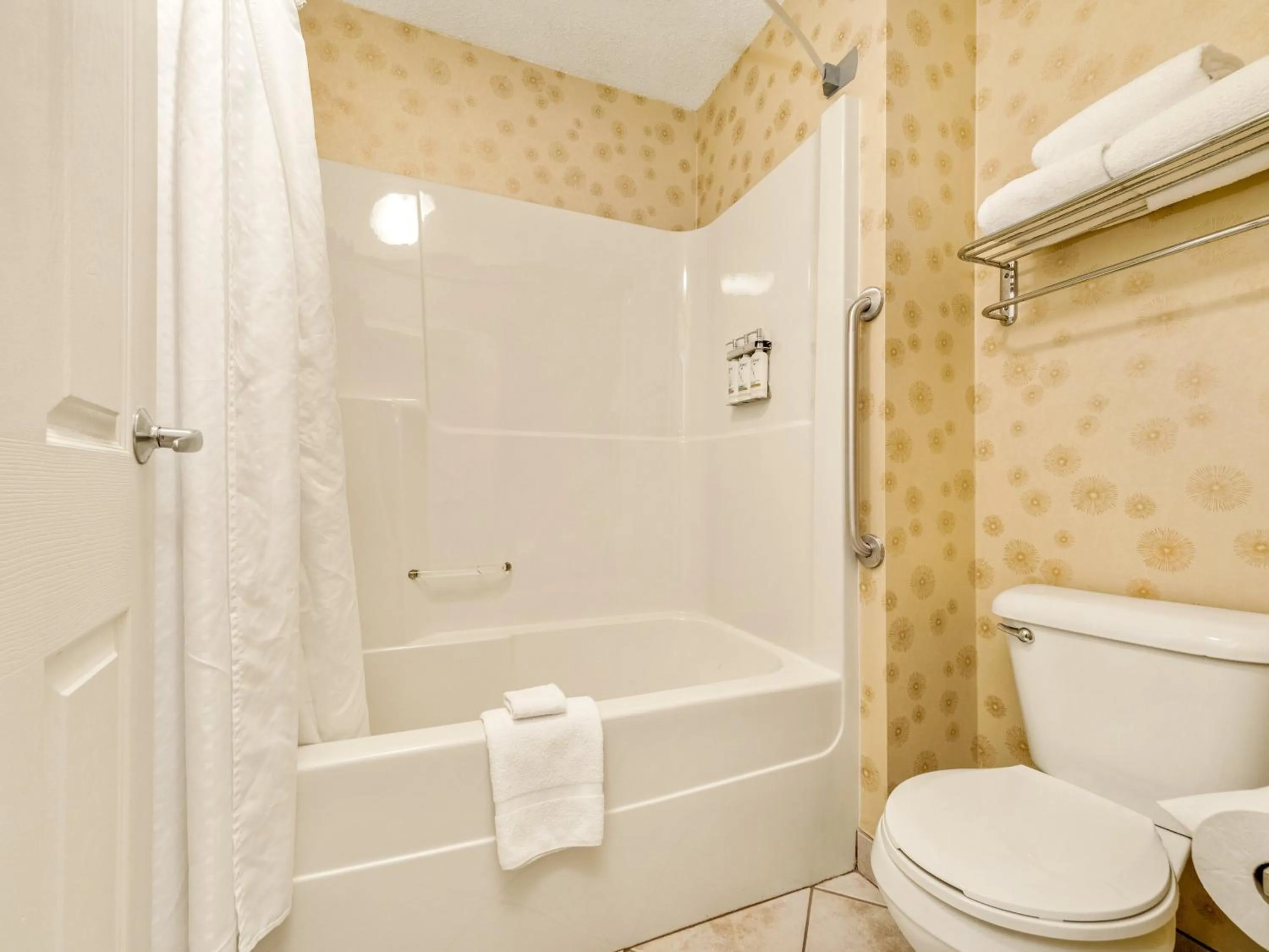 Toilet in Holiday Inn Lethbridge by IHG