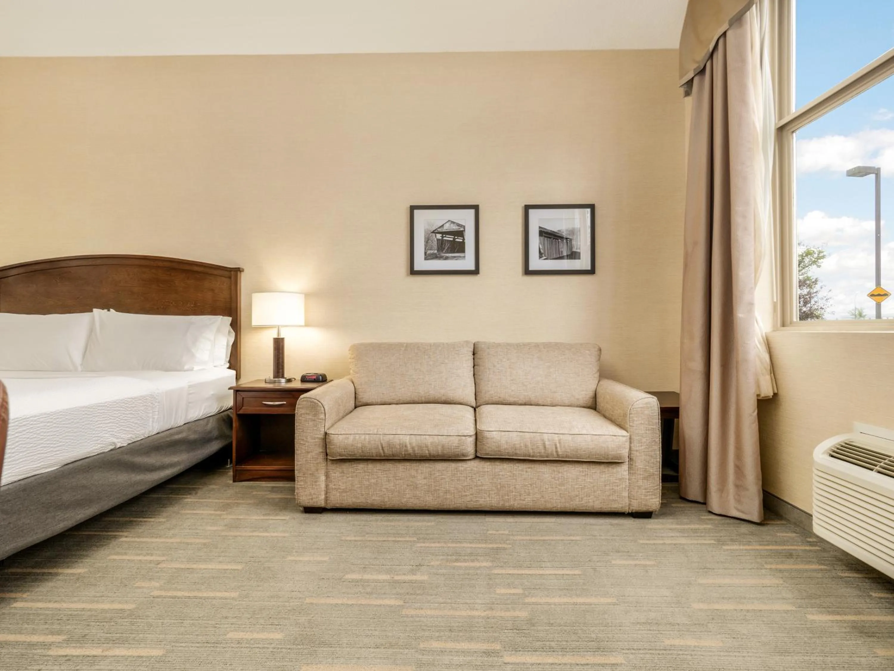 Seating area, Bed in Holiday Inn Lethbridge by IHG