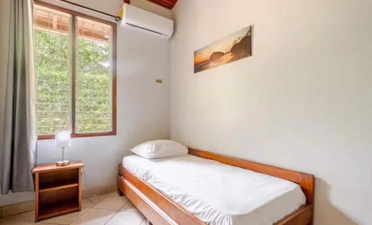 Bed in Bahia Esmeralda Boutique Hotel & Villas