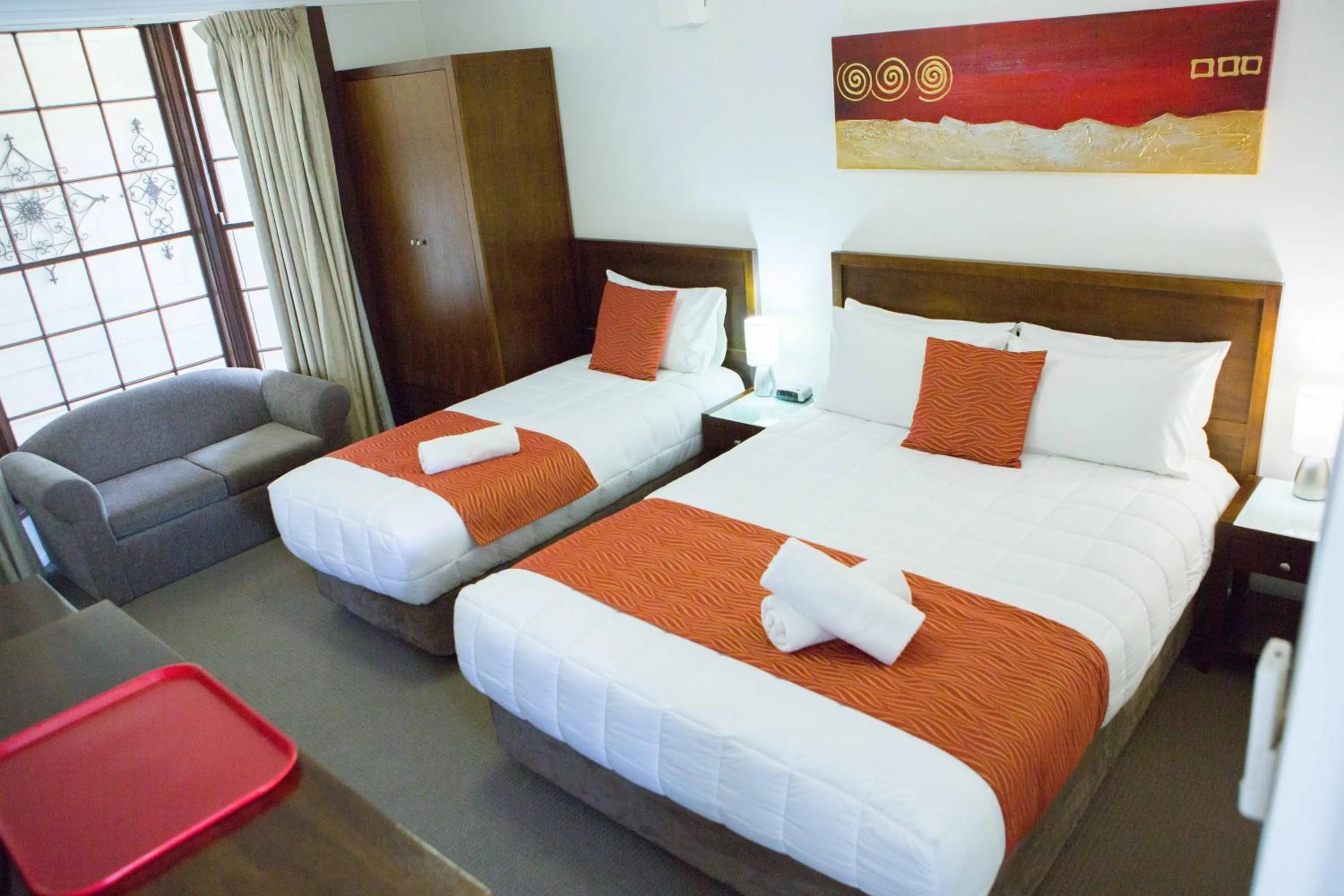 Bed in Colonial Lodge Motor Inn