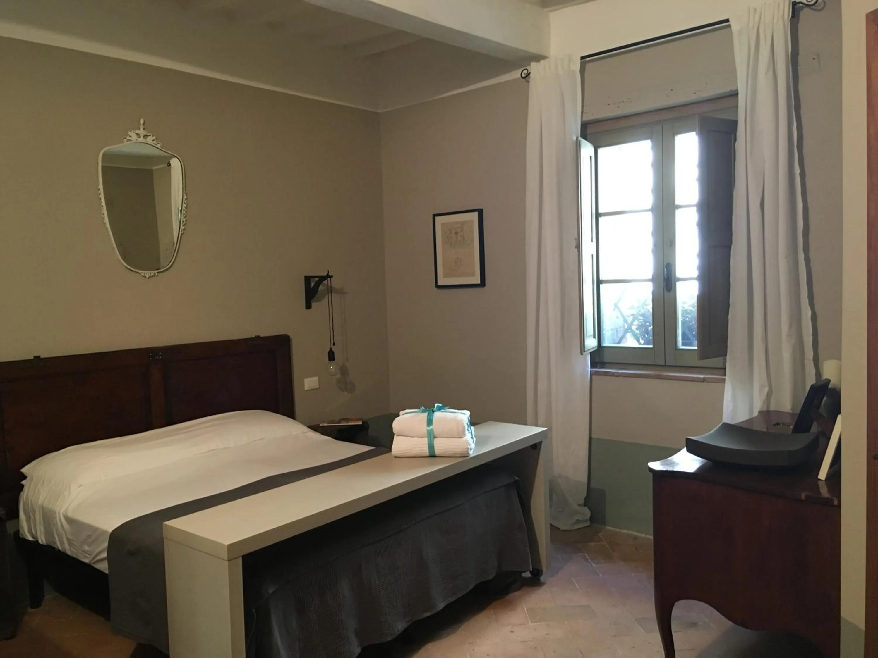 Photo of the whole room, Bed in B&B Locanda Toscanini