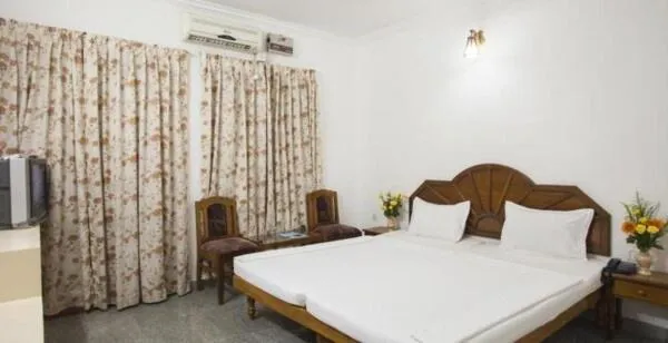 Bed in Marine Palace Beach Hotel