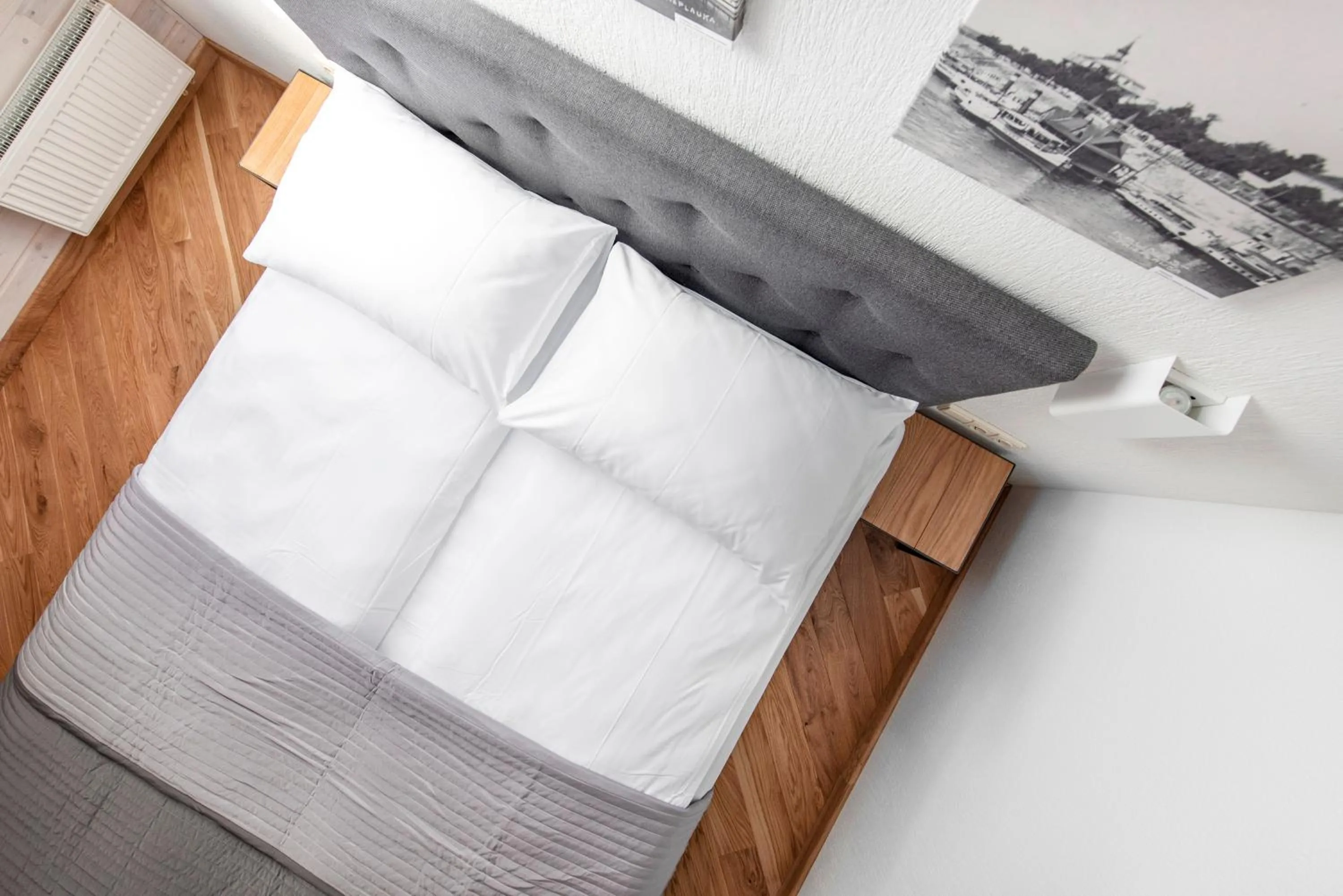 Bed in Piano Apartments