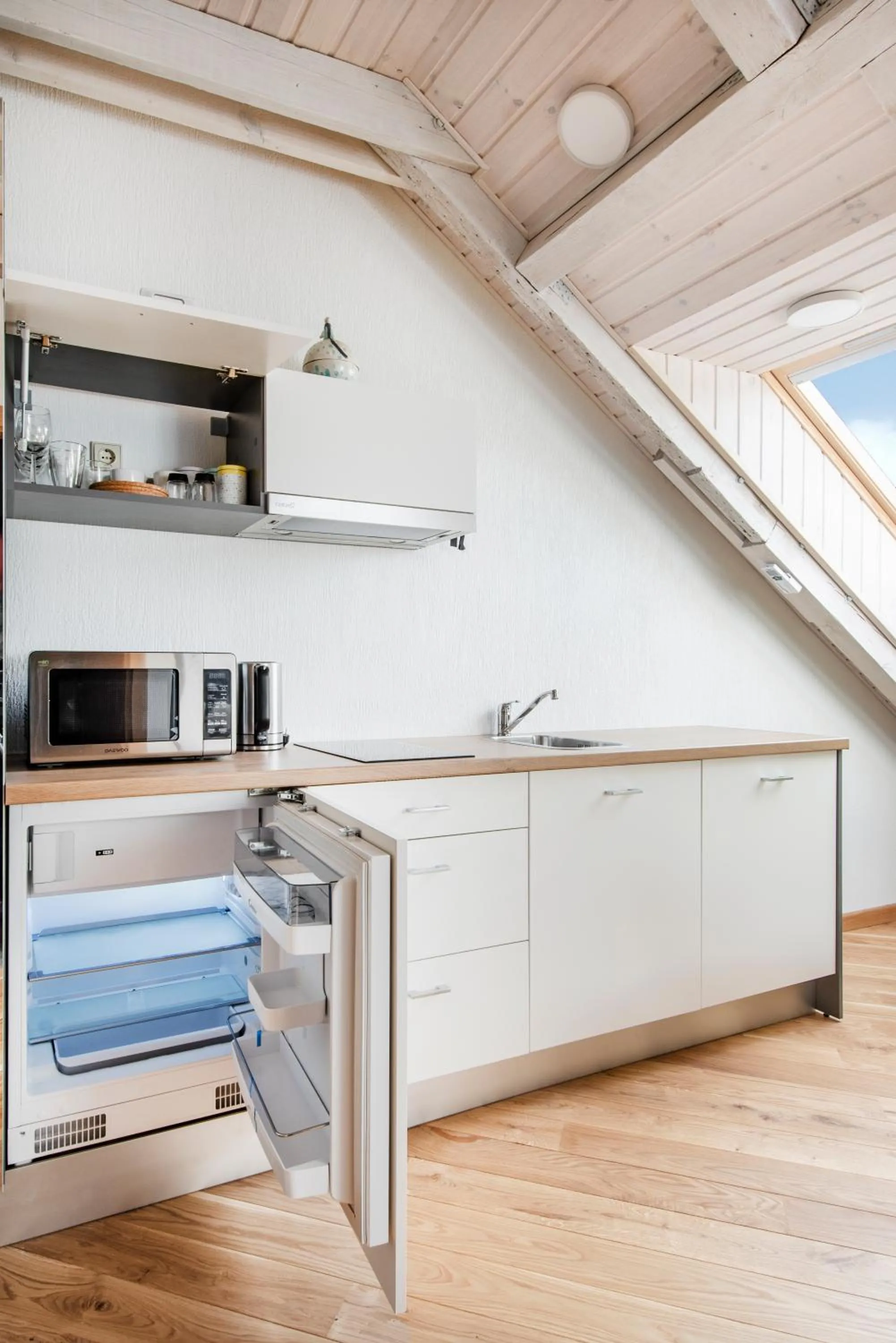 Kitchen or kitchenette in Piano Apartments