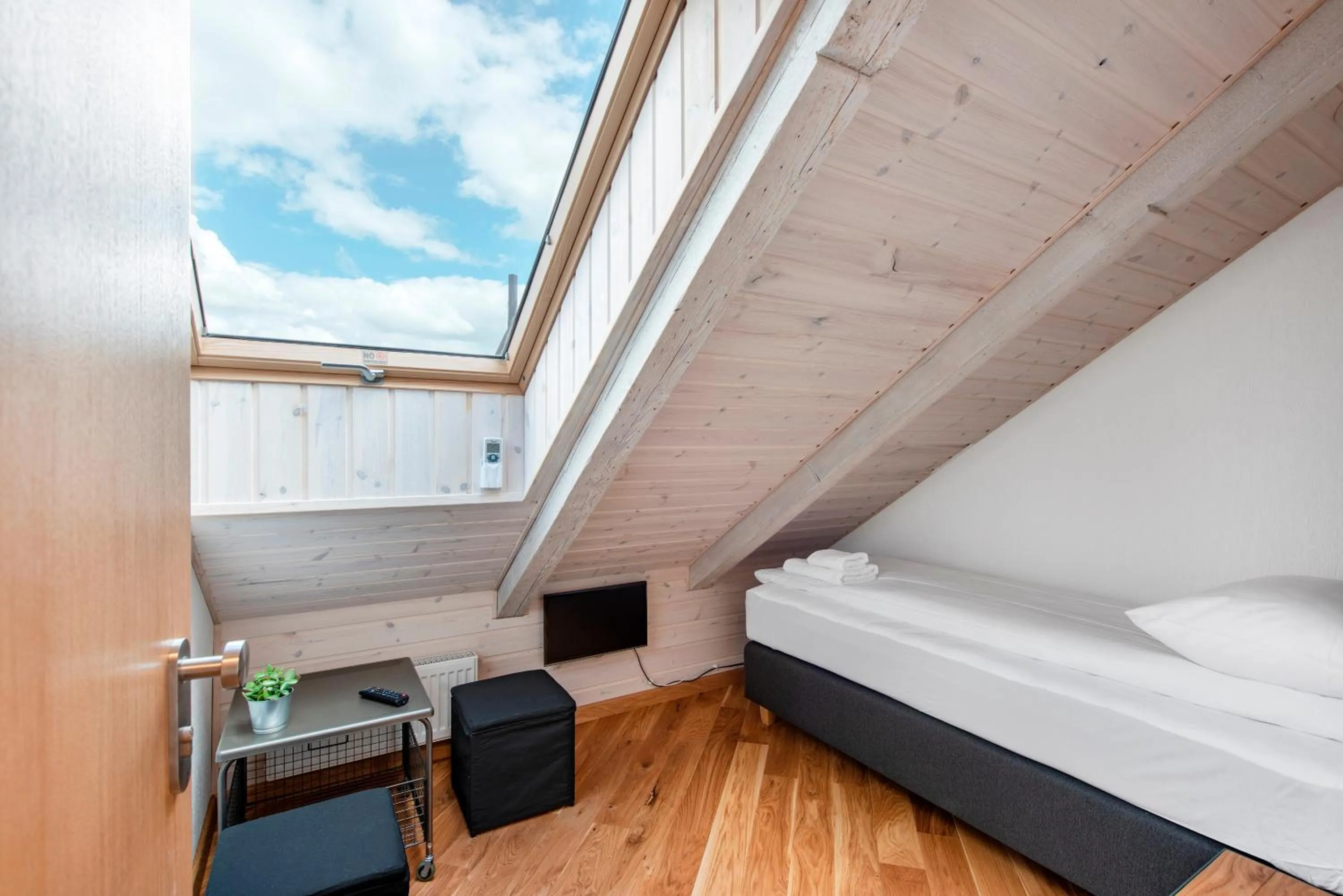 Bed in Piano Apartments