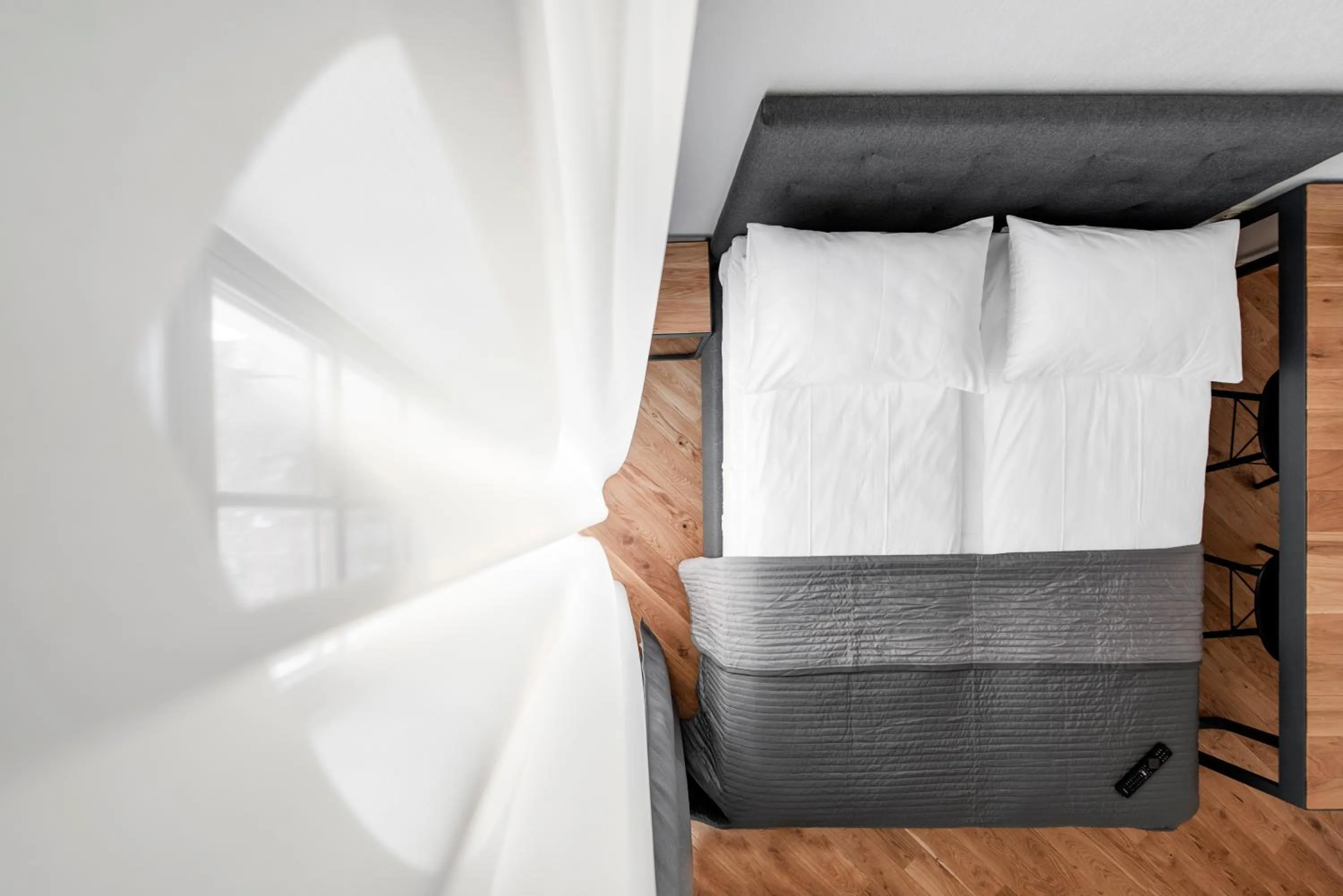 Bed in Piano Apartments