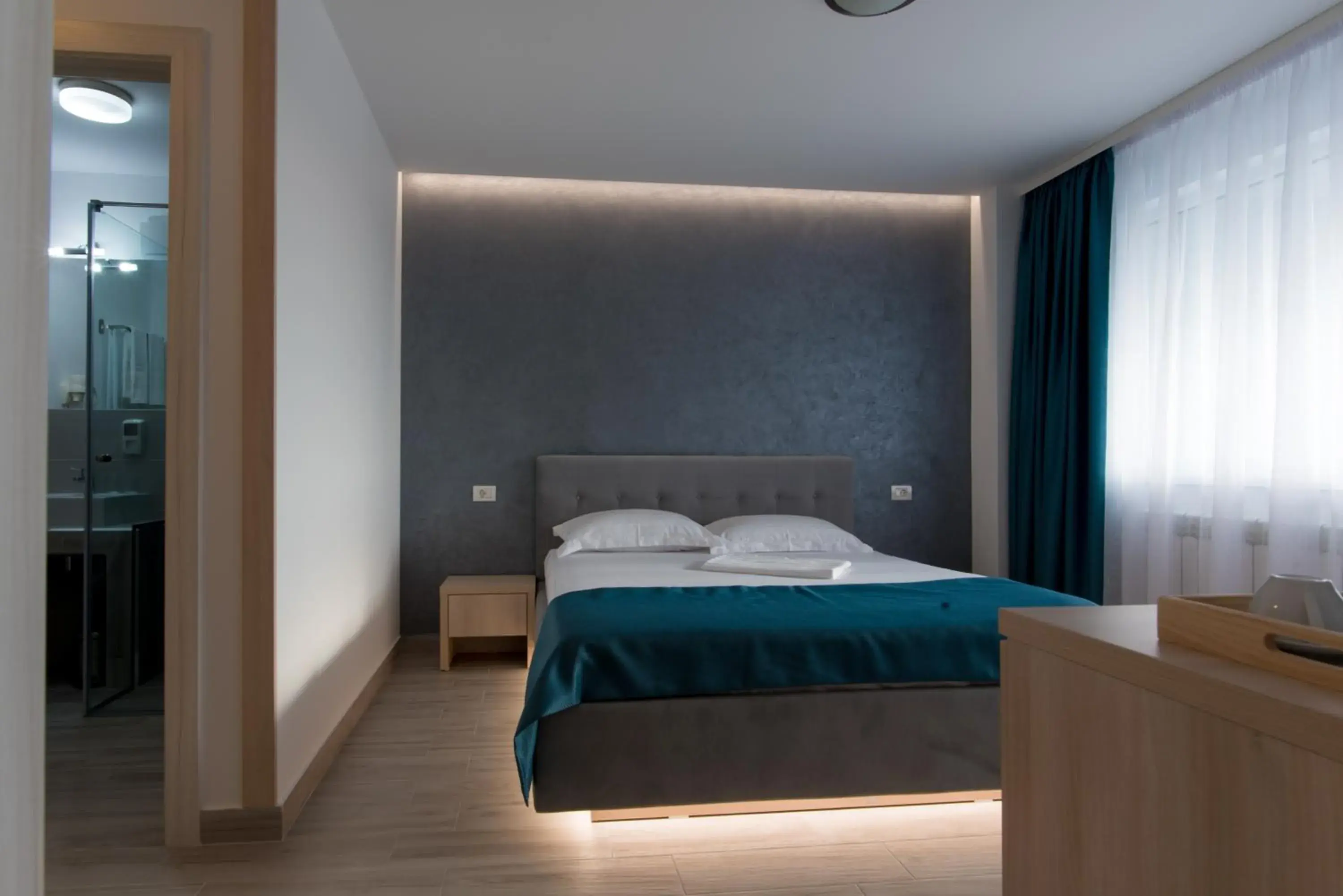 King Room with Balcony in Turquoise Boutique King Room with Balcony in Turquoise Boutique