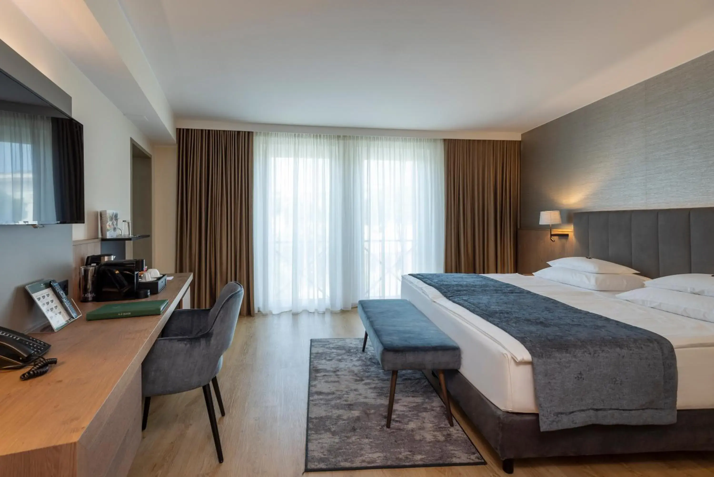 Junior Suite with City View - single occupancy in Rogner Hotel Tirana Junior Suite with City View - single occupancy in Rogner Hotel Tirana
