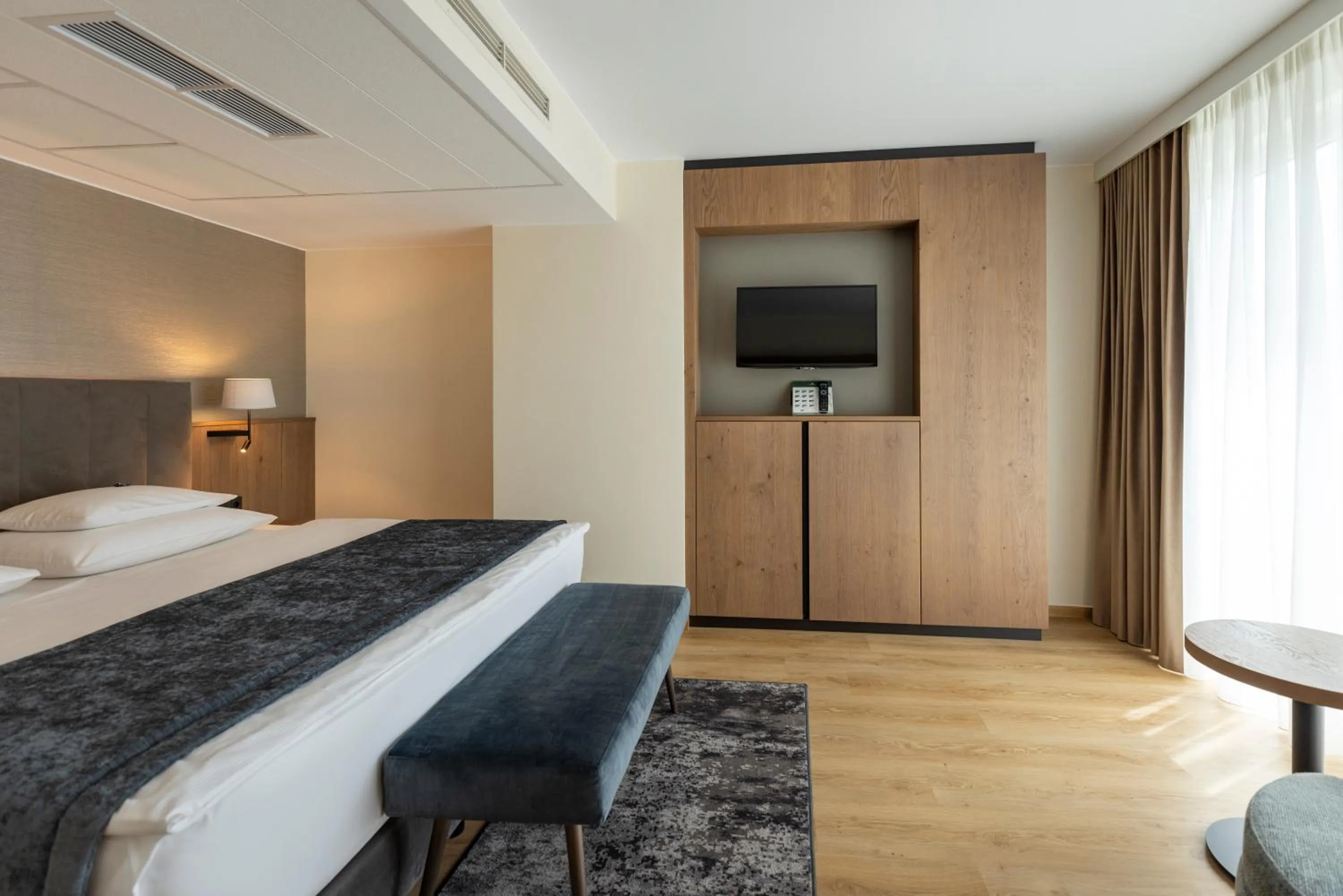 Photo of the whole room, Bed in Rogner Hotel Tirana