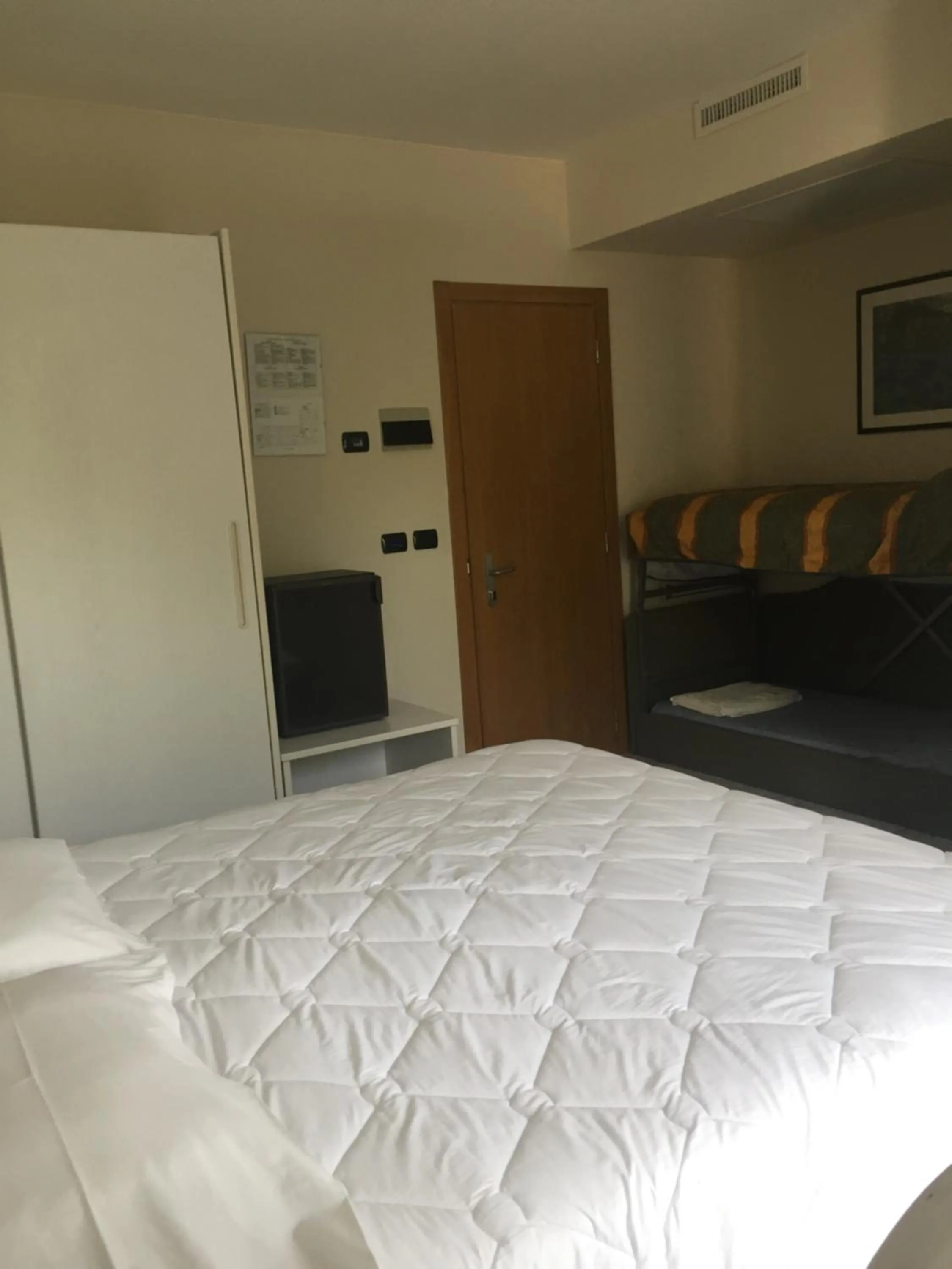 Day, Bed in Hotel Consuelo