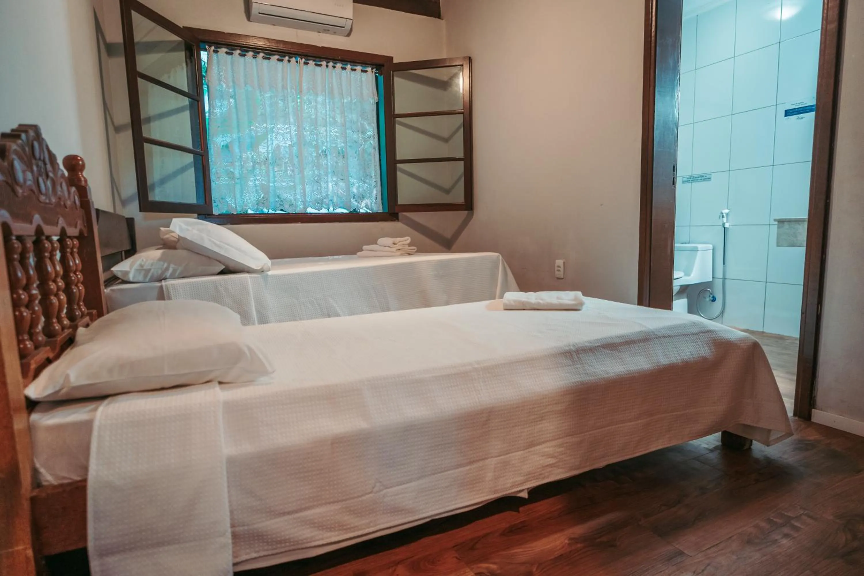 Photo of the whole room, Bed in Pousada Villa Atlântica