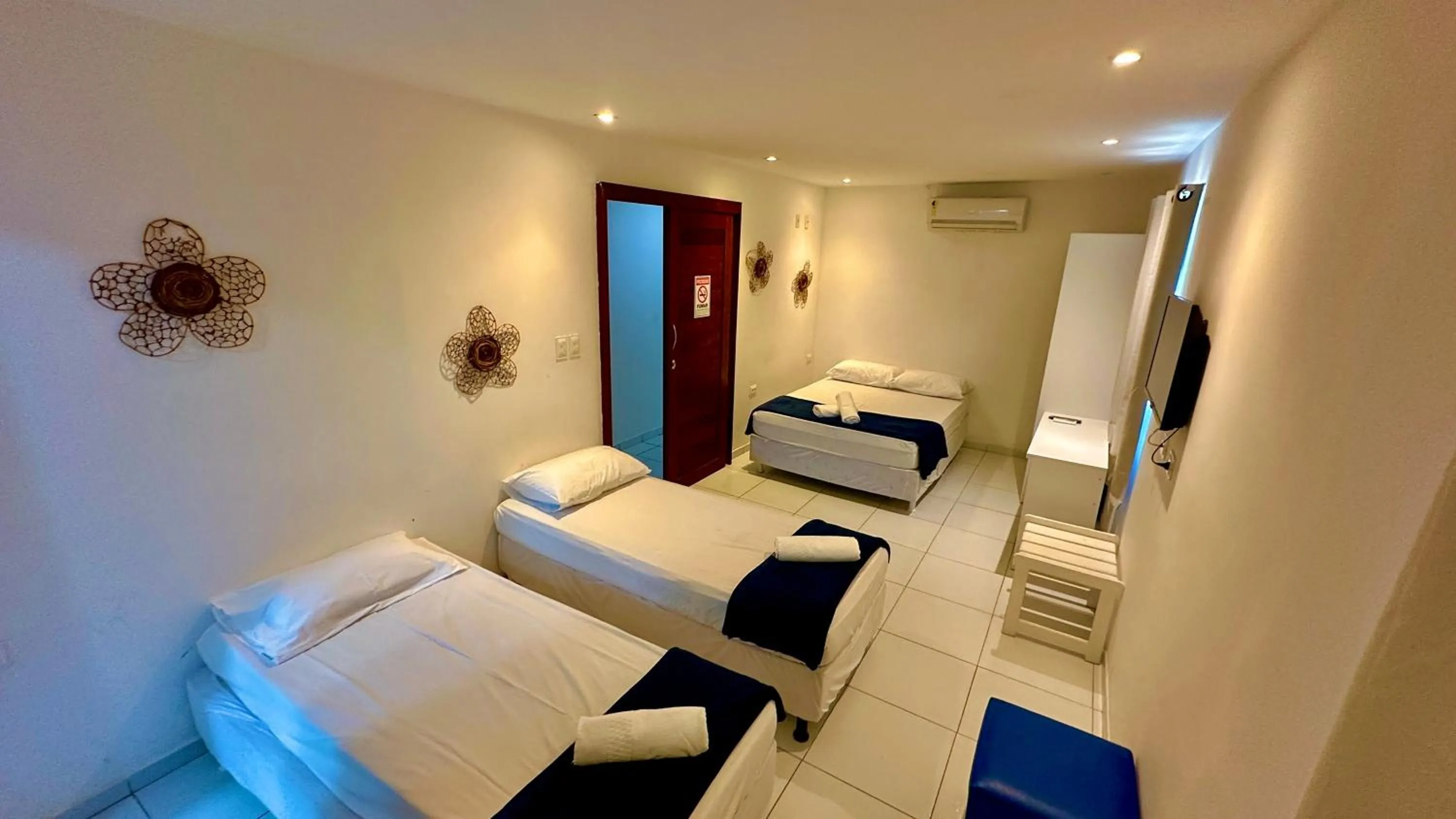 Bed in Paranambuca Pousada