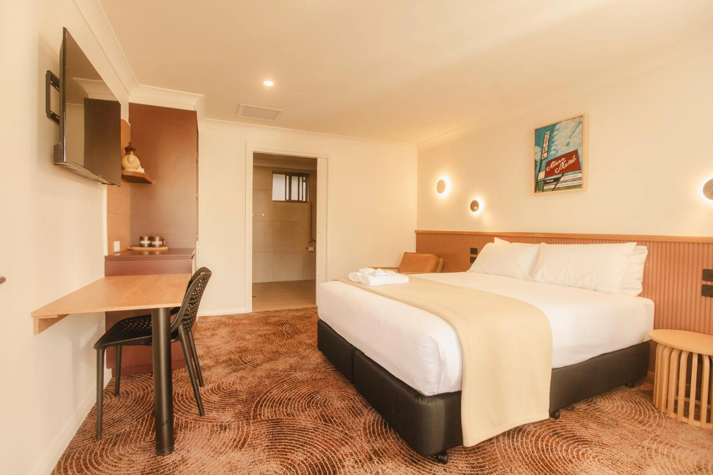 Bed in The Alluna Motel, an Ascend Collection Hotel