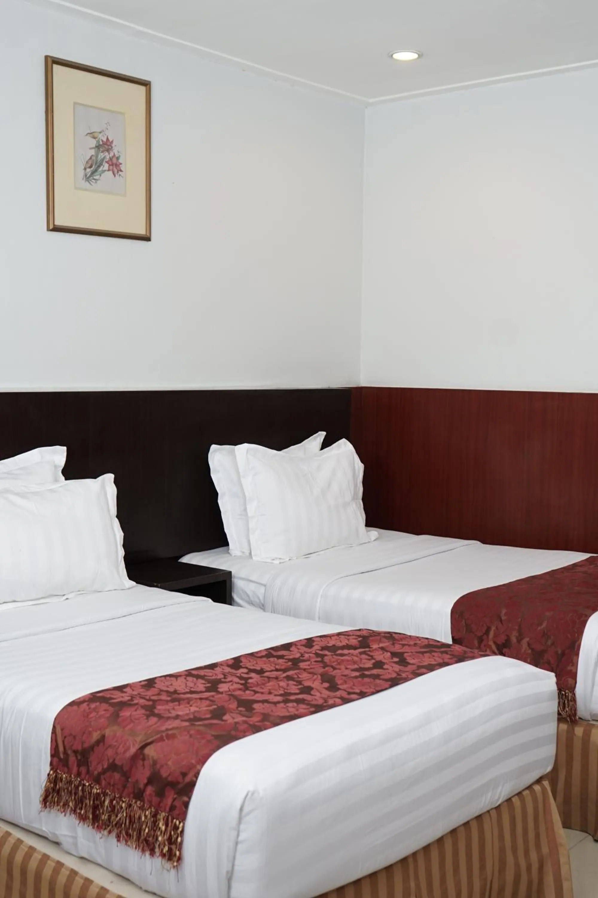 Bed in Rudang Hotel & Resort Berastagi